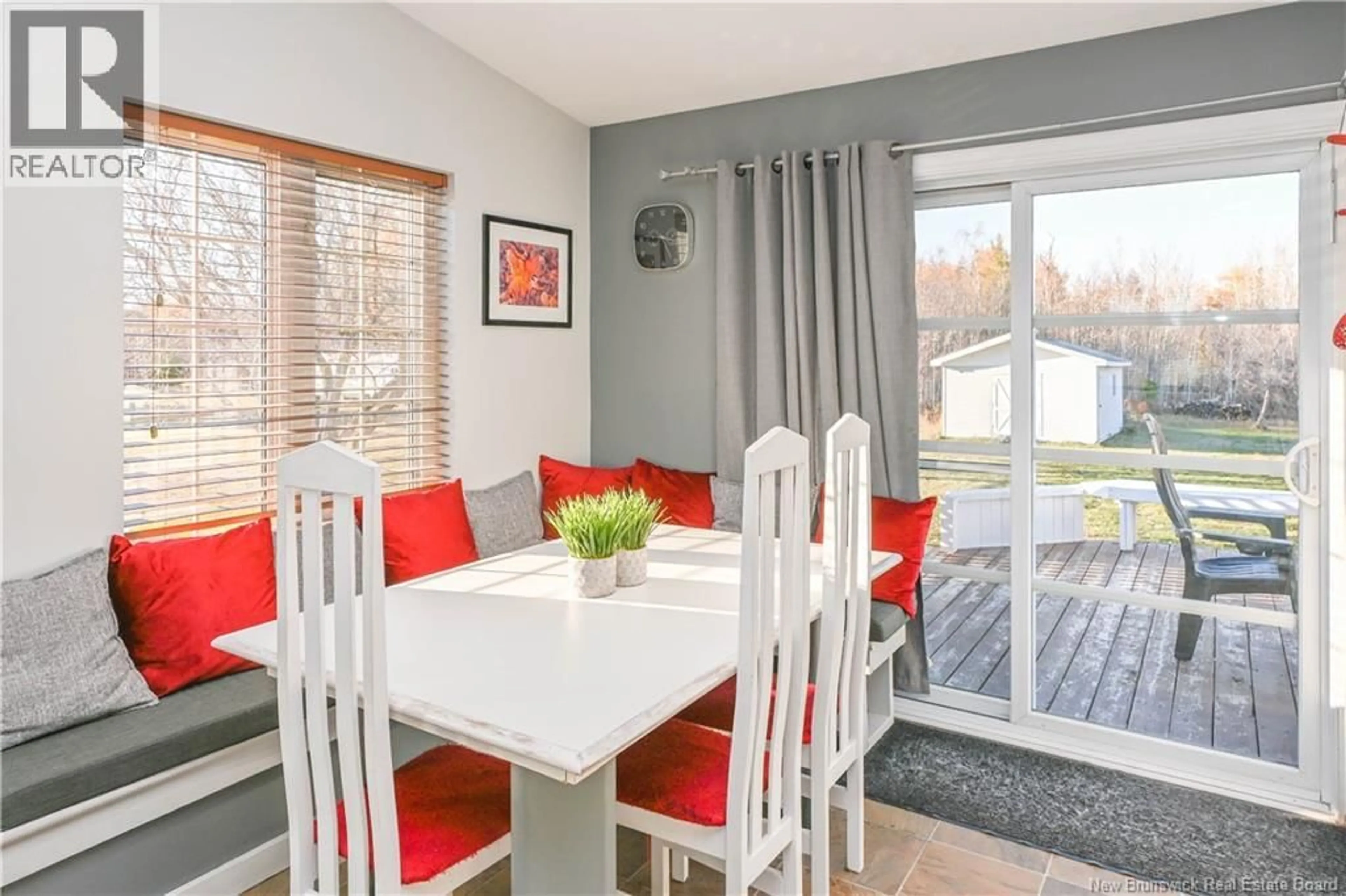 Dining room, wood/laminate floor for 77 DES ANCÊTRES ROAD, Saint-Simon New Brunswick E8P1Y4