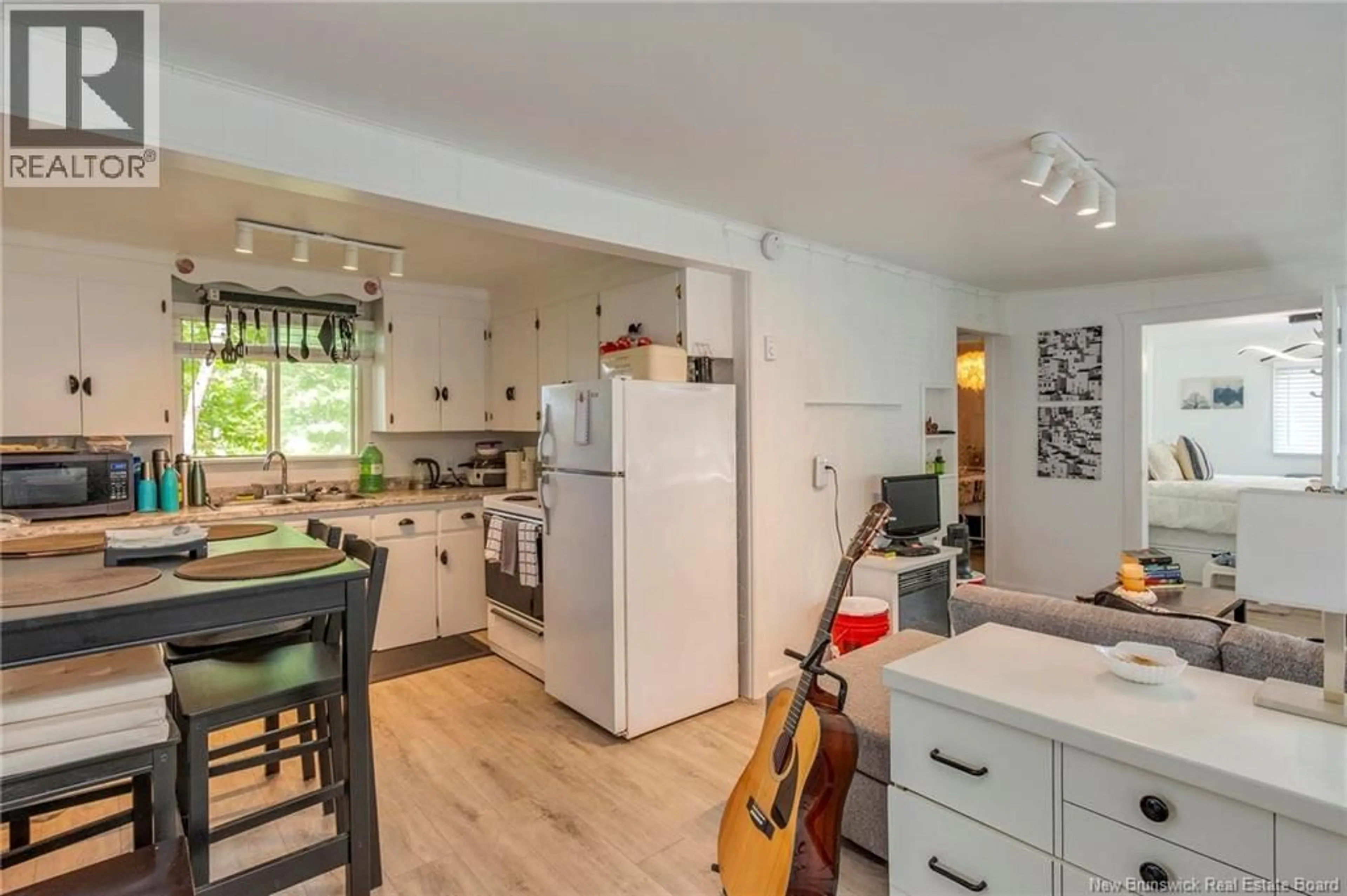 Open concept kitchen, wood/laminate floor for 134 HAPPY DAYS ESTATES ROAD, Grande-Digue New Brunswick E4R4L6