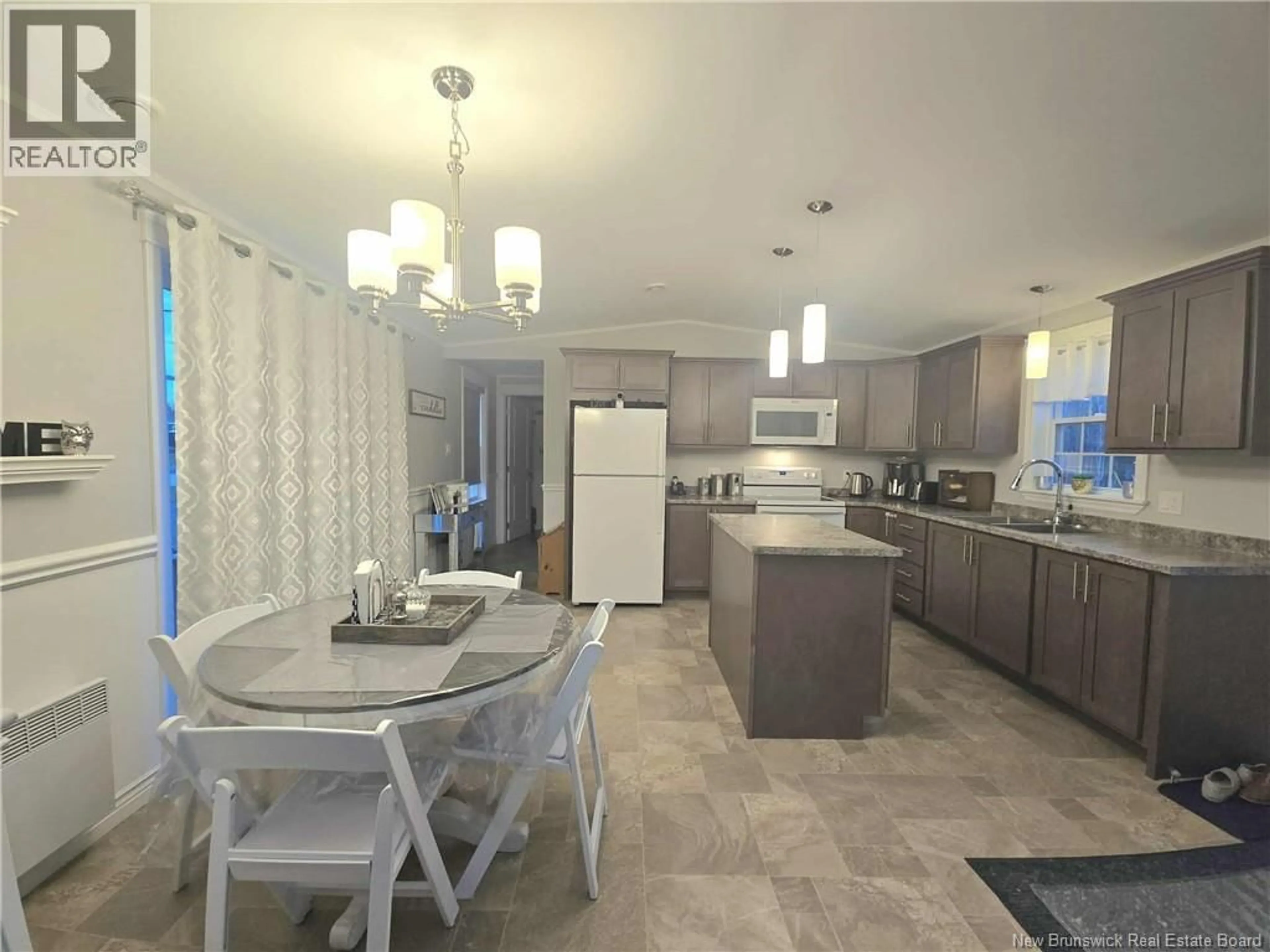 Open concept kitchen, ceramic/tile floor for 24 OLIVIA, Miramichi New Brunswick E1V0K5