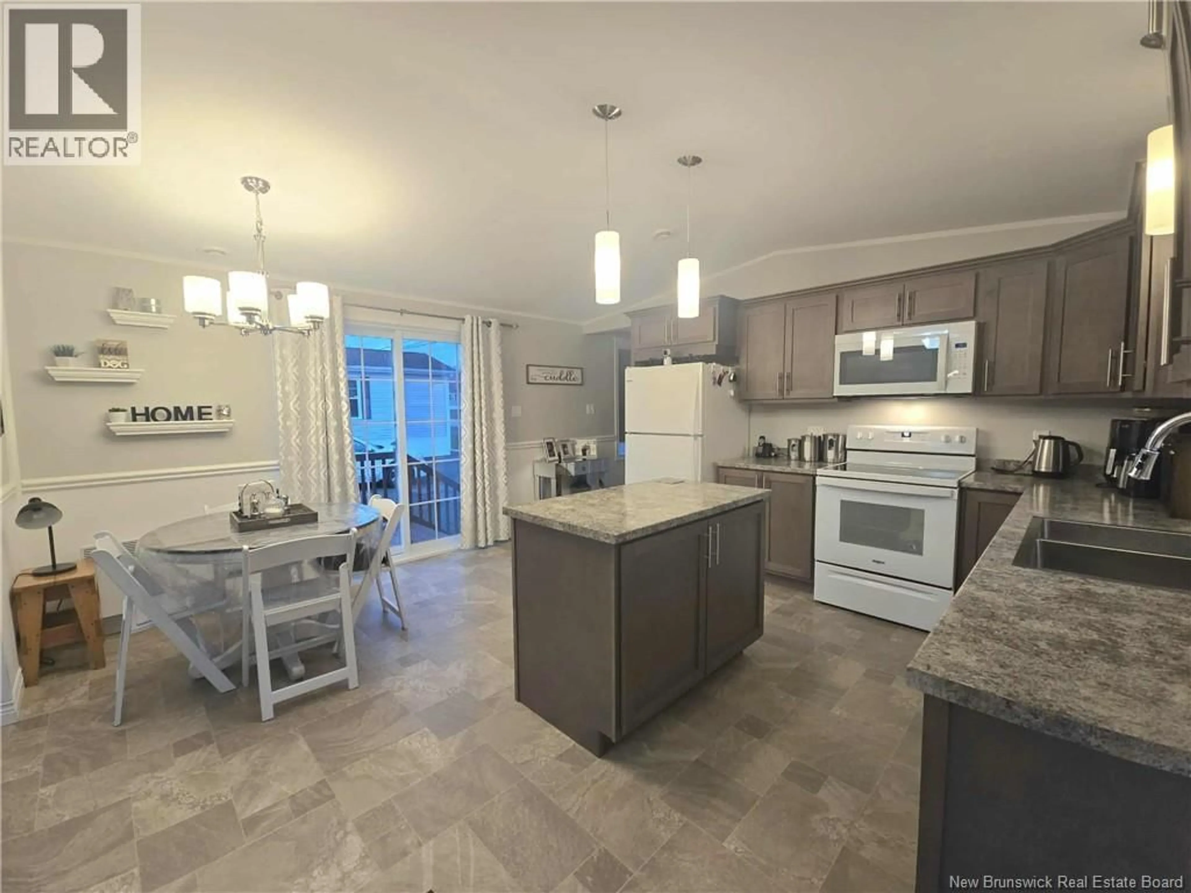 Open concept kitchen, ceramic/tile floor for 24 OLIVIA, Miramichi New Brunswick E1V0K5