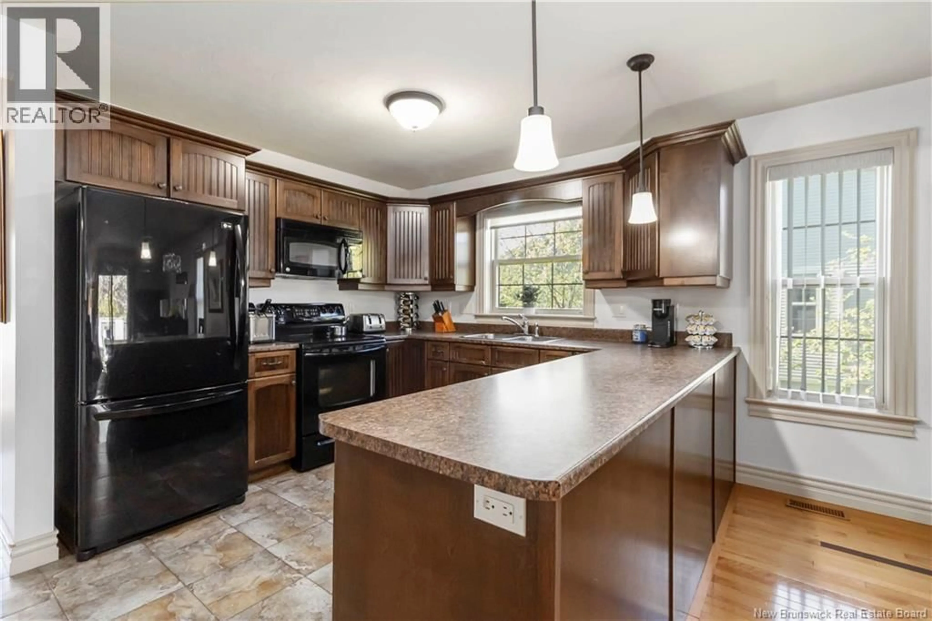 Open concept kitchen, ceramic/tile floor for 47 NEWBERRY STREET, Moncton New Brunswick E1G5M5