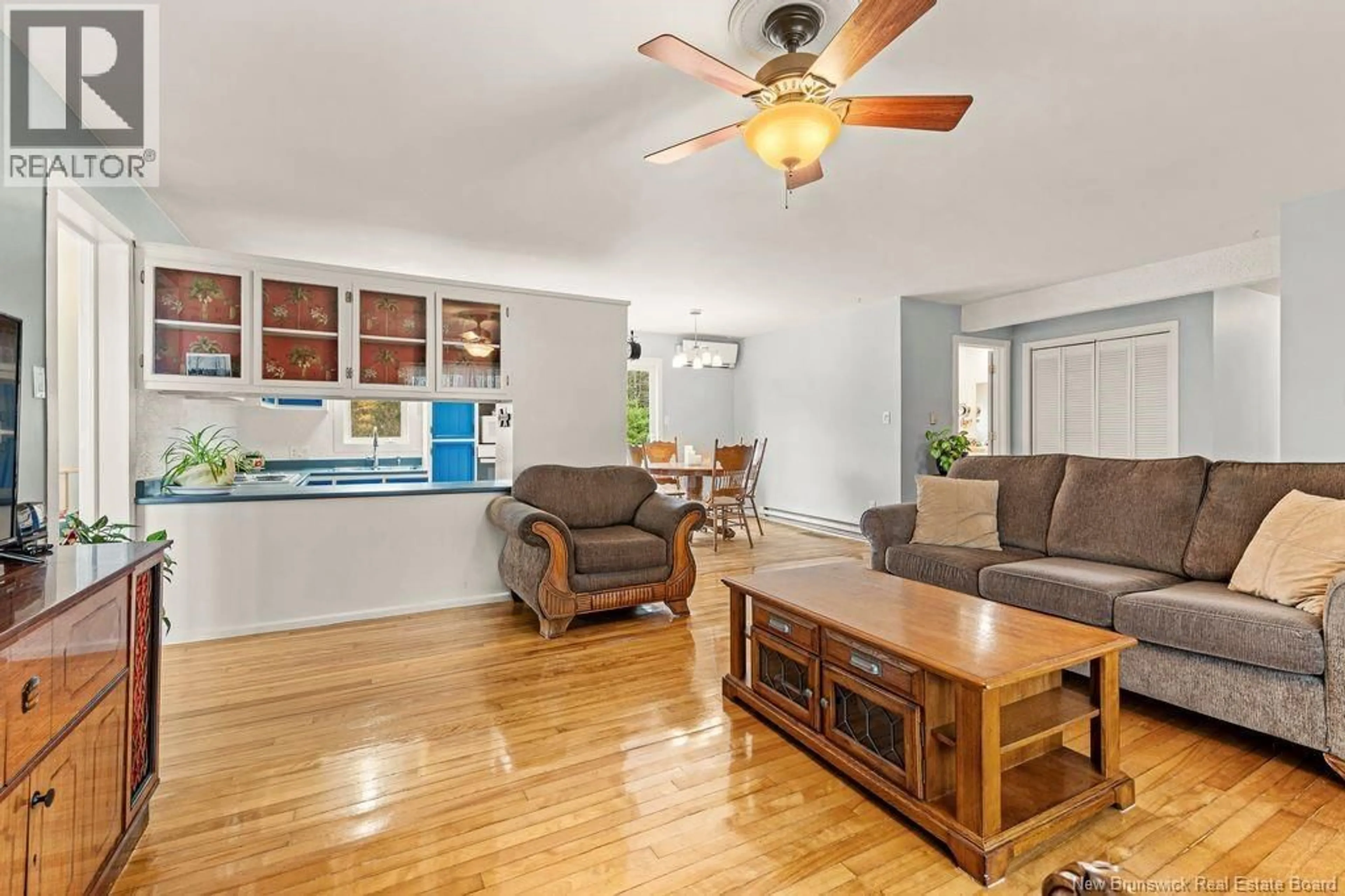 Living room with furniture, wood/laminate floor for 1044 MURRAY ROAD, Cocagne New Brunswick E4R2V3