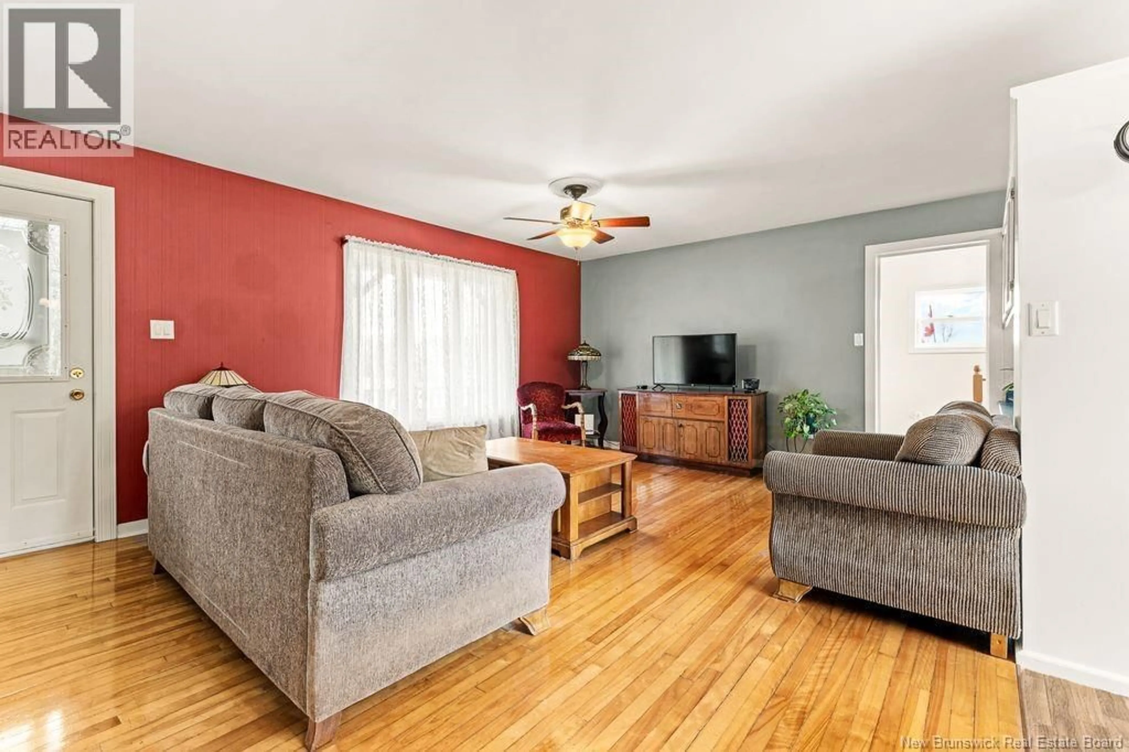 Living room with furniture, wood/laminate floor for 1044 MURRAY ROAD, Cocagne New Brunswick E4R2V3