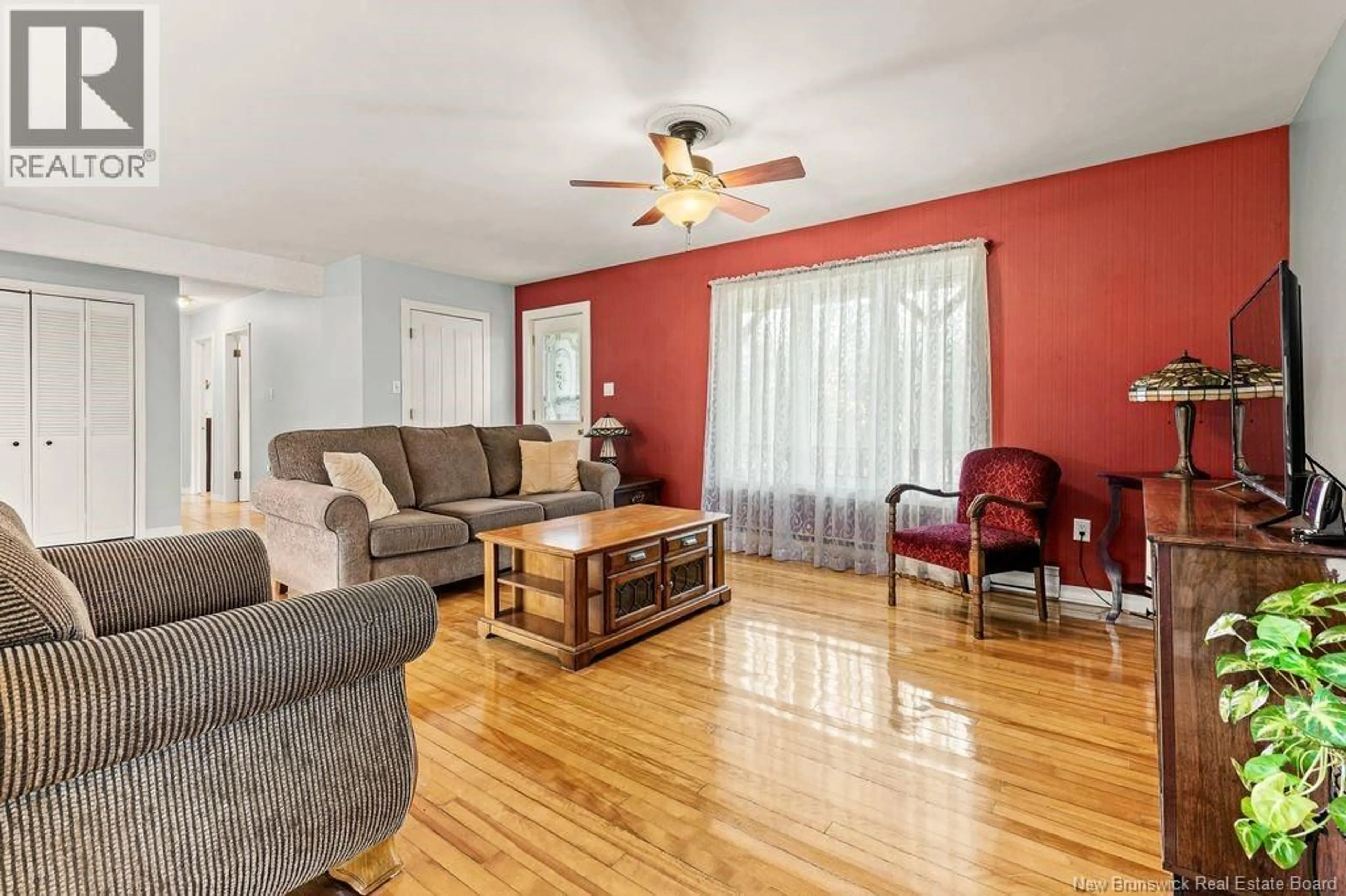 Living room with furniture, wood/laminate floor for 1044 MURRAY ROAD, Cocagne New Brunswick E4R2V3