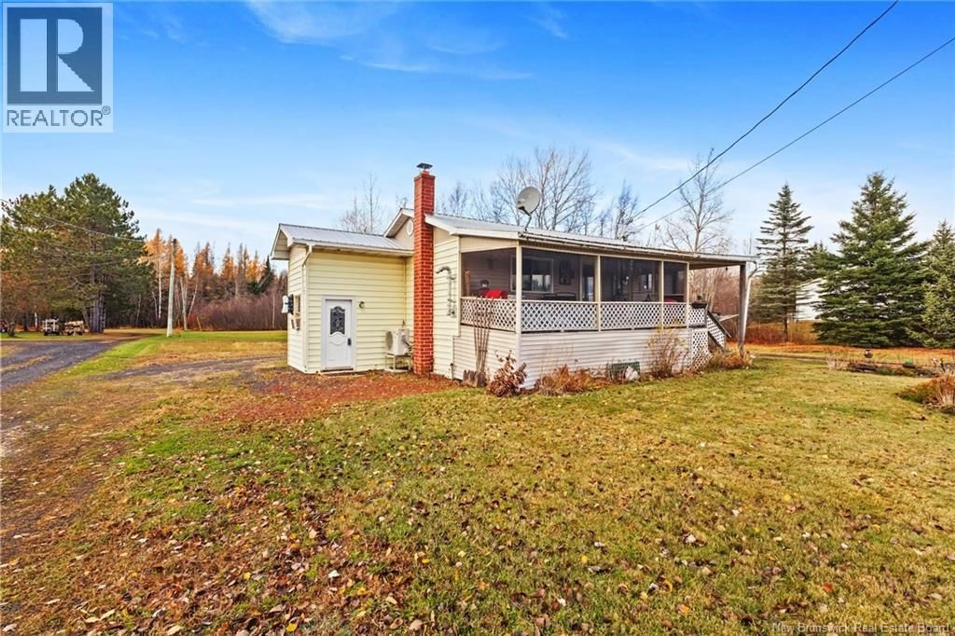 A pic from outside/outdoor area/front of a property/back of a property/a pic from drone, unknown for 32 PLEASANT DRIVE, Chipman New Brunswick E4A1S3