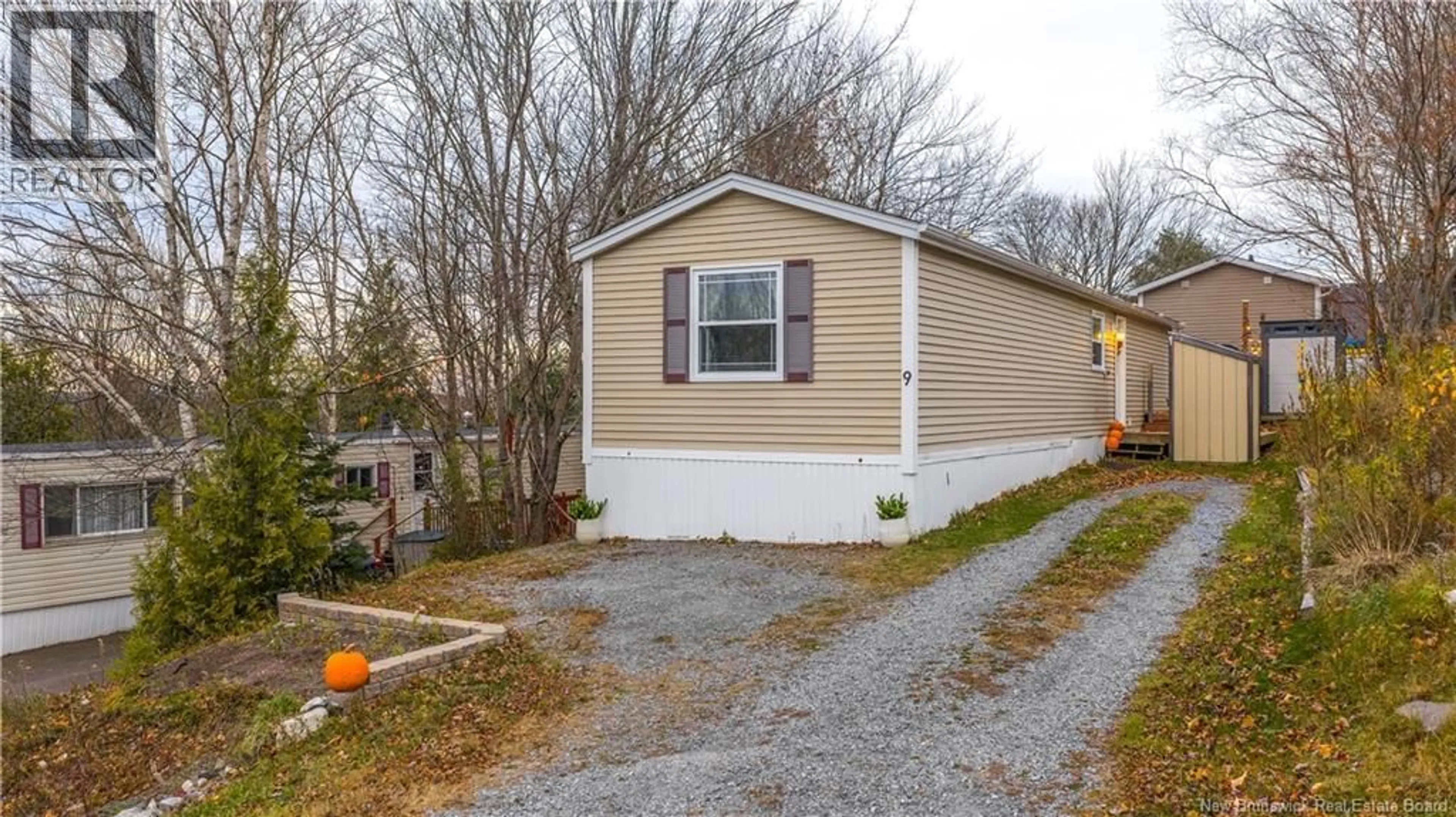 Home with vinyl exterior material, street for 9 FIFTH STREET, Quispamsis New Brunswick E2G1V7