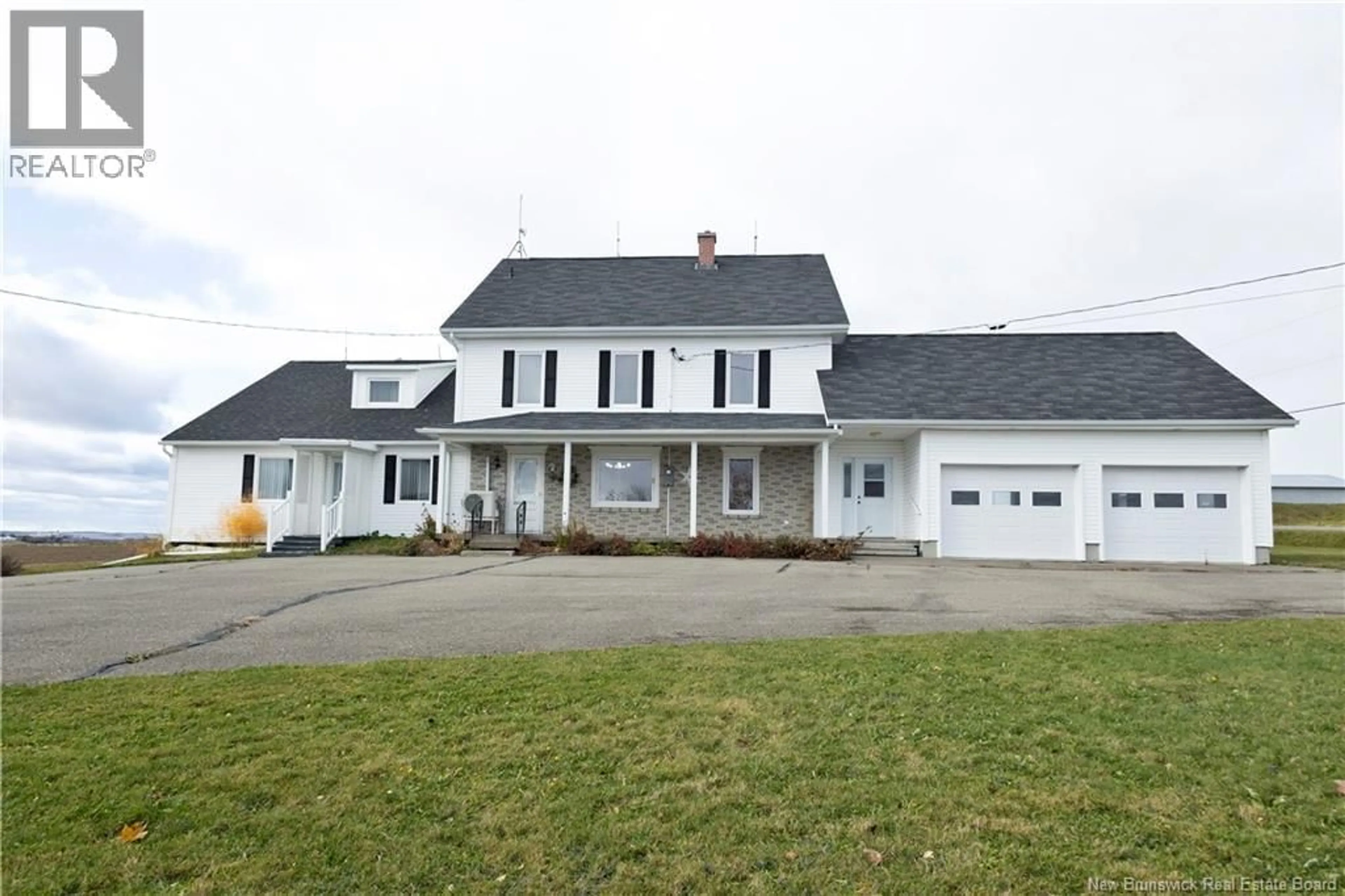 Home with vinyl exterior material, street for 375 CH 1ER RANG, DSL de Drummond/DSL of Drummond New Brunswick E3Y2S8