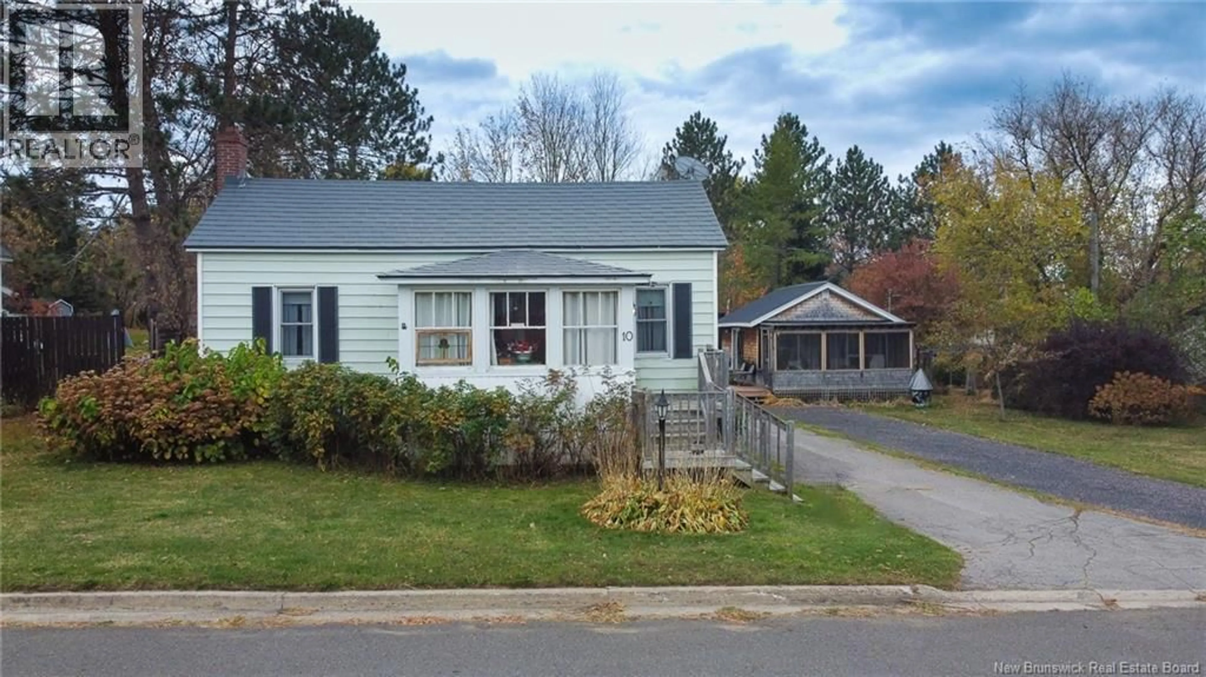Home with vinyl exterior material, street for 10 HILLCREST AVENUE, Chipman New Brunswick E4A1X9