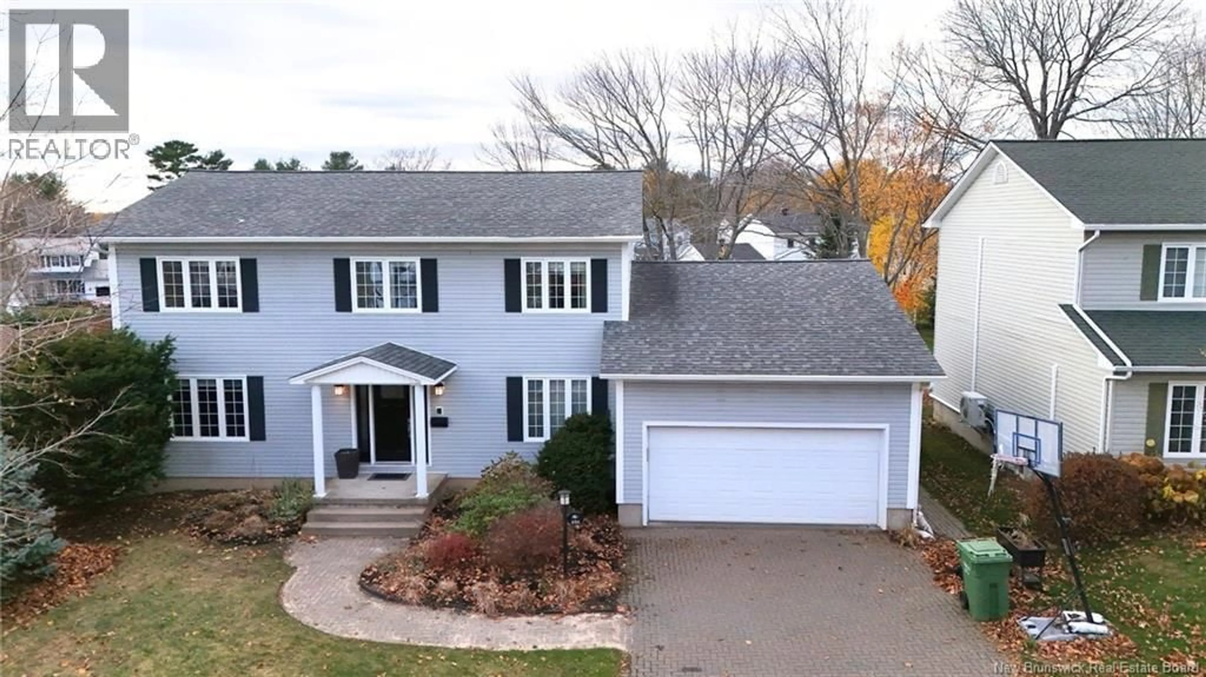 A pic from outside/outdoor area/front of a property/back of a property/a pic from drone, street for 131 WIGGINS DRIVE, Fredericton New Brunswick E3A5N7