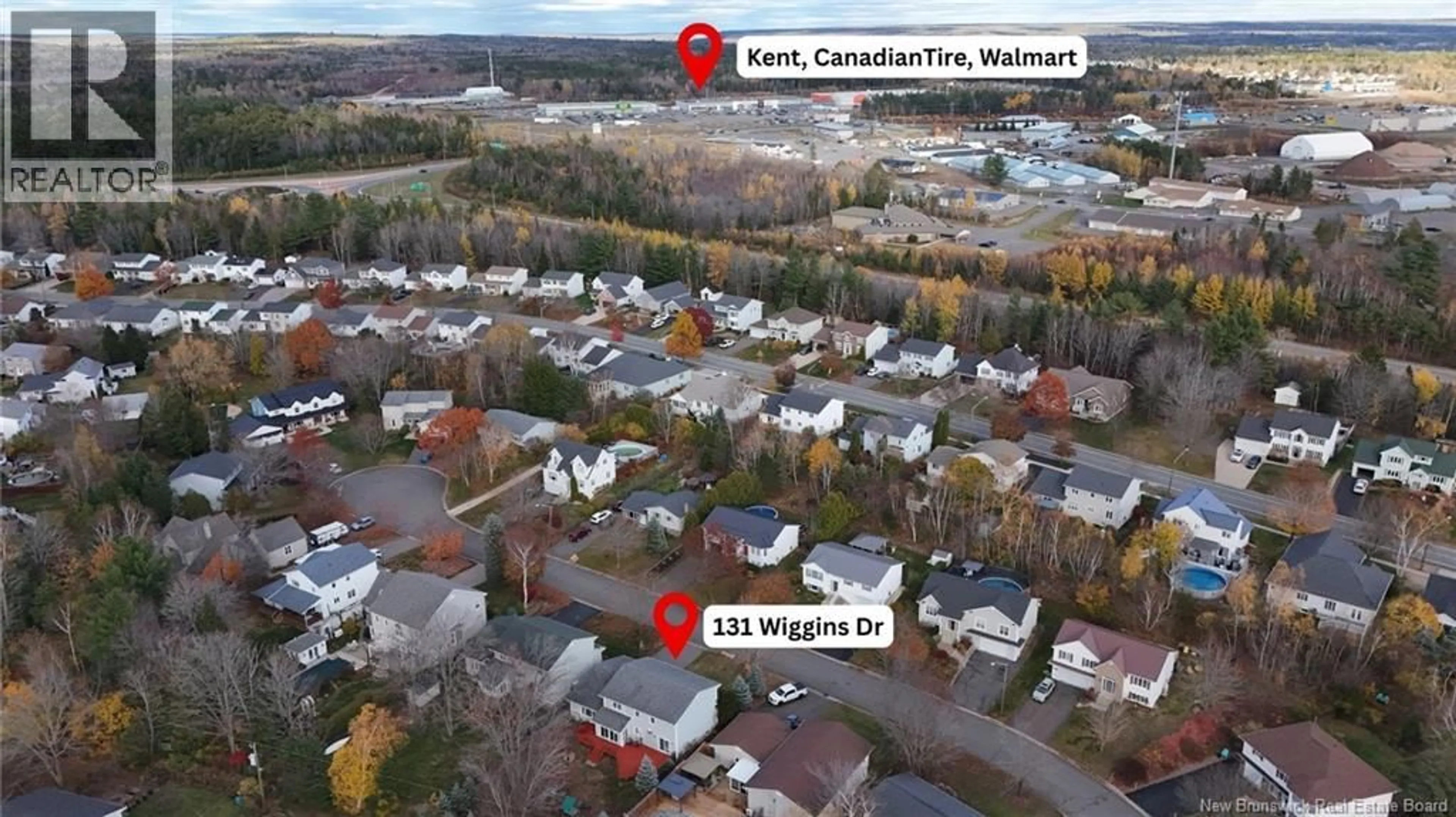 A pic from outside/outdoor area/front of a property/back of a property/a pic from drone, street for 131 WIGGINS DRIVE, Fredericton New Brunswick E3A5N7