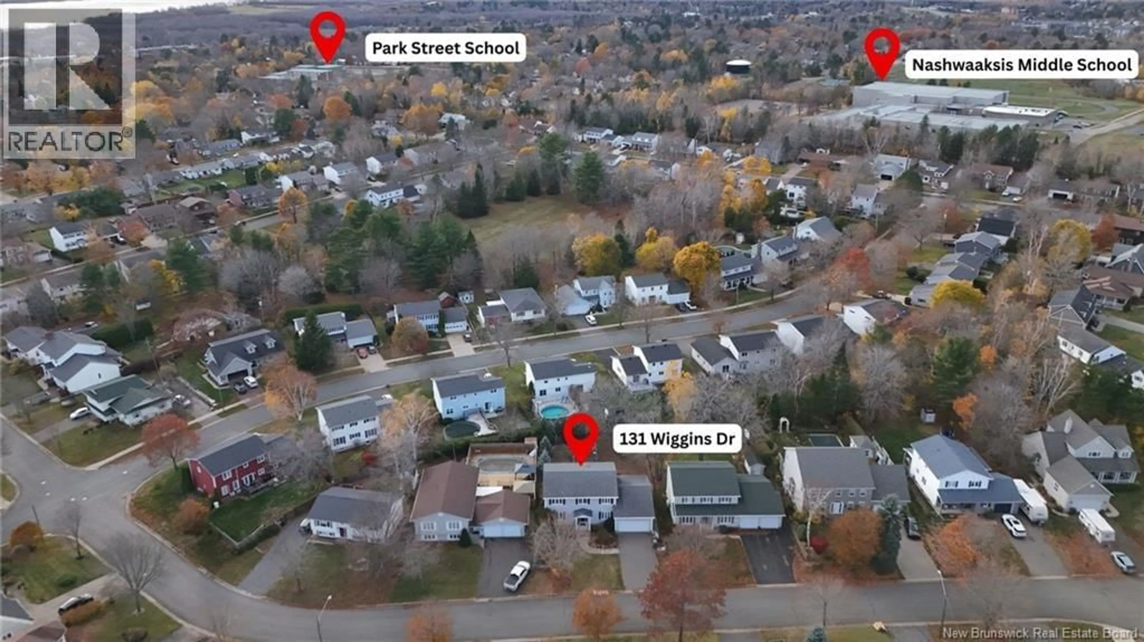 A pic from outside/outdoor area/front of a property/back of a property/a pic from drone, street for 131 WIGGINS DRIVE, Fredericton New Brunswick E3A5N7