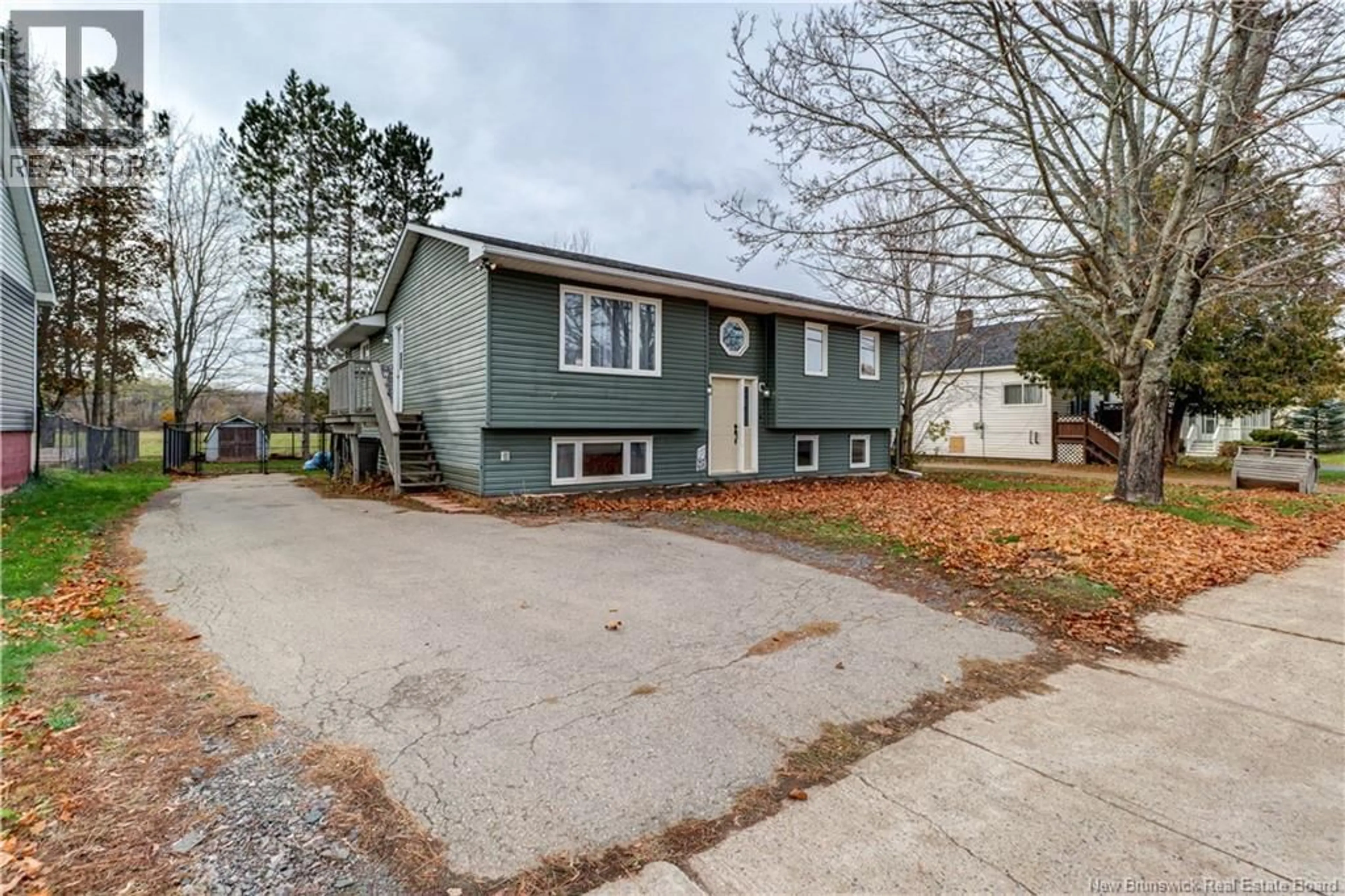 Home with vinyl exterior material, street for 33 NEEDLE STREET, Sussex Corner New Brunswick E4E2Z2