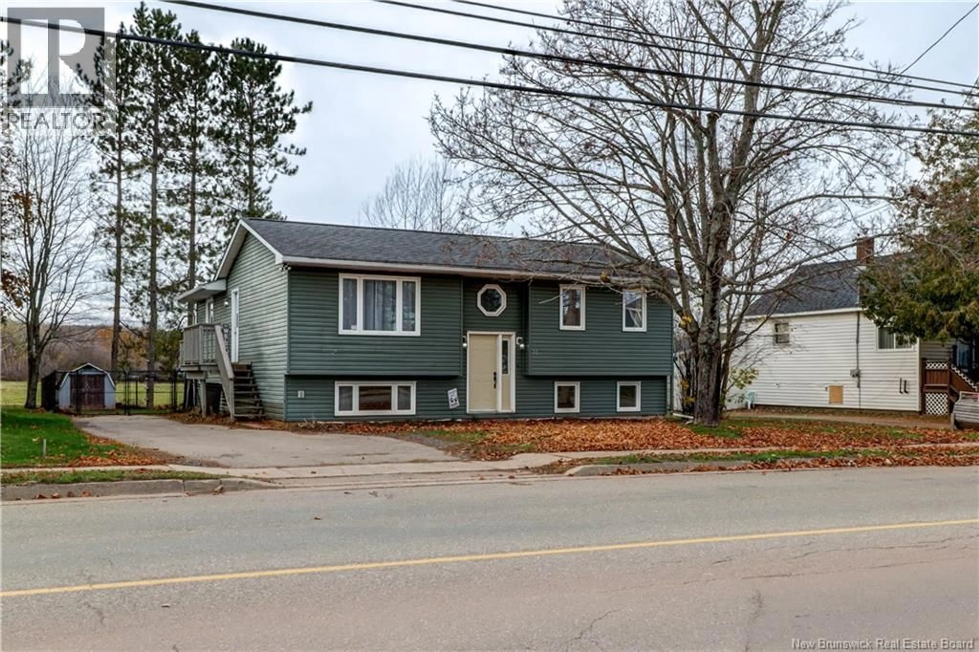 Home with vinyl exterior material, street for 33 NEEDLE STREET, Sussex Corner New Brunswick E4E2Z2