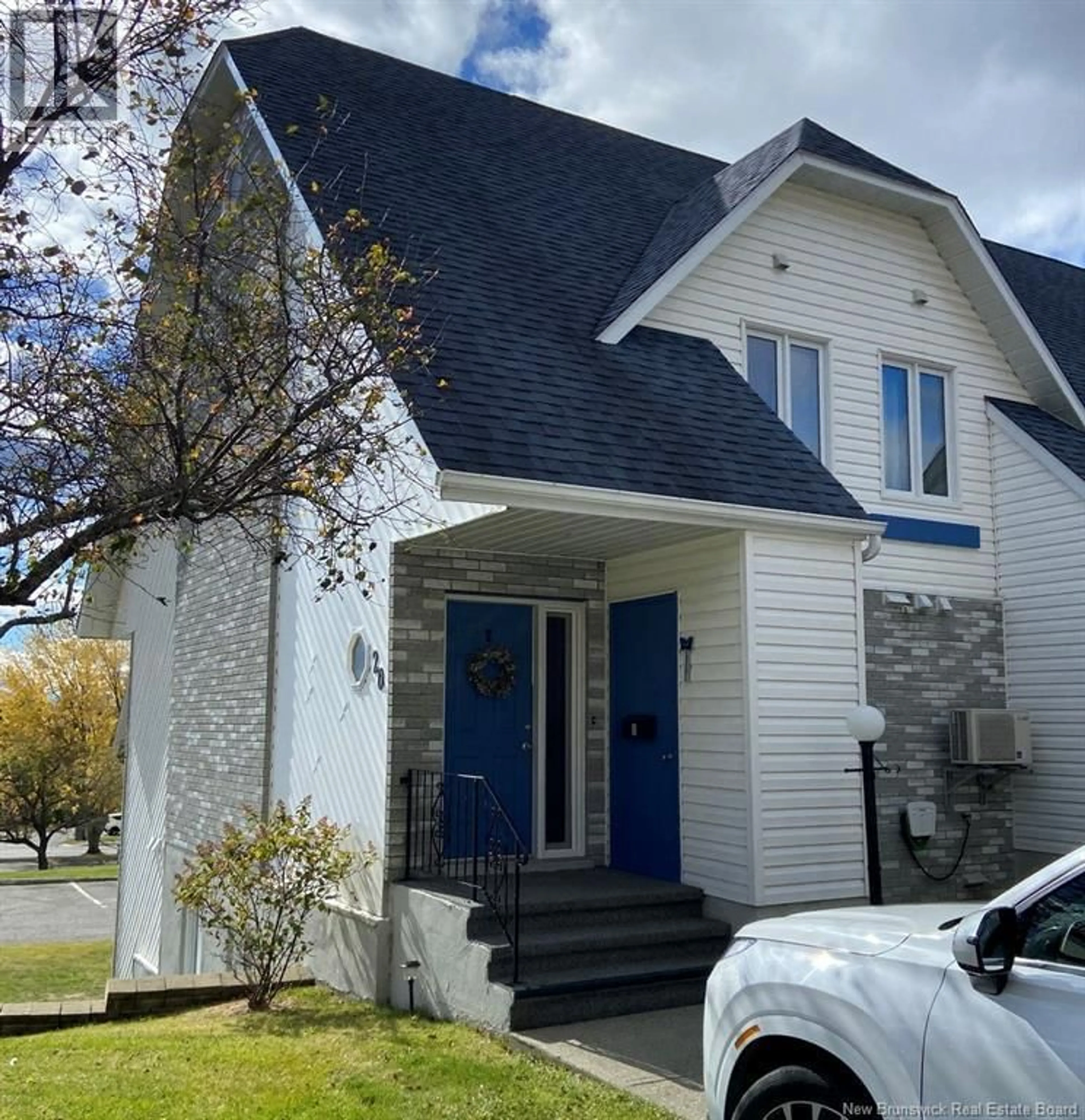 Home with vinyl exterior material, street for 20 DU BOURG AVENUE, Edmundston New Brunswick E3V4C5