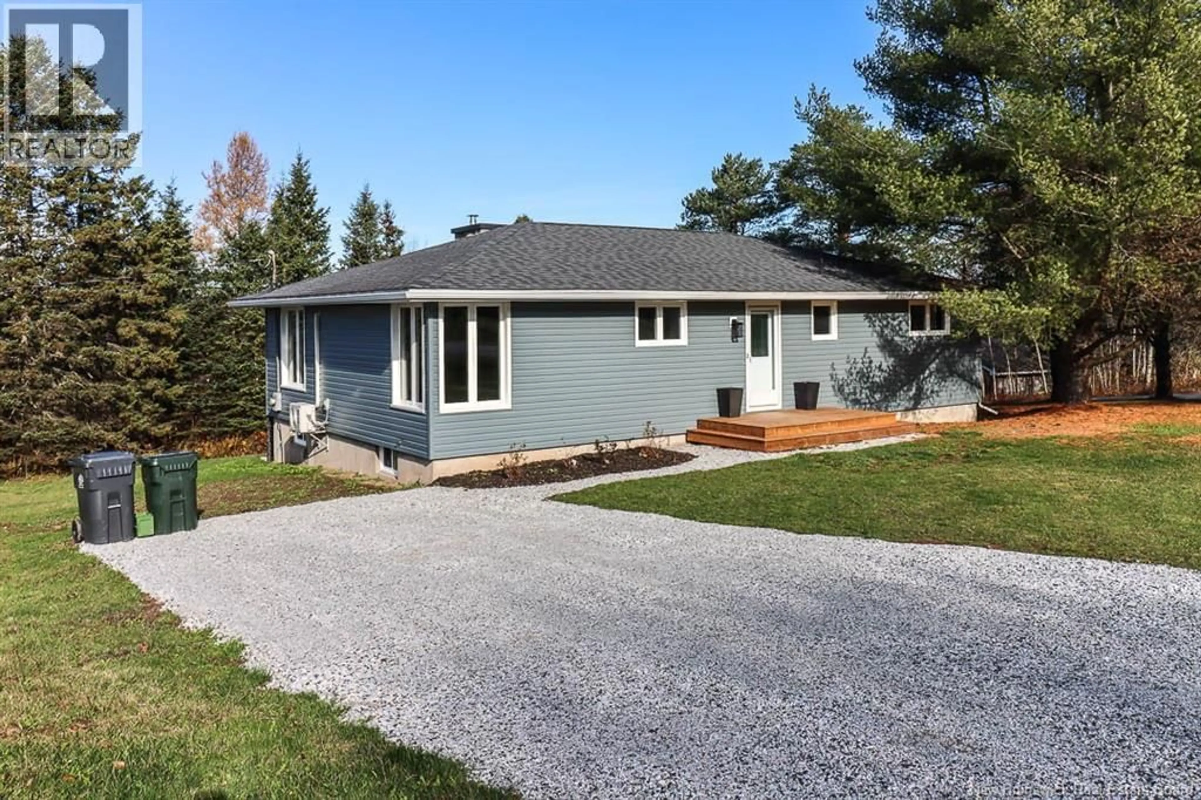 Home with vinyl exterior material, street for 2 YOUNG ROAD, Nauwigewauk New Brunswick E5N6V5