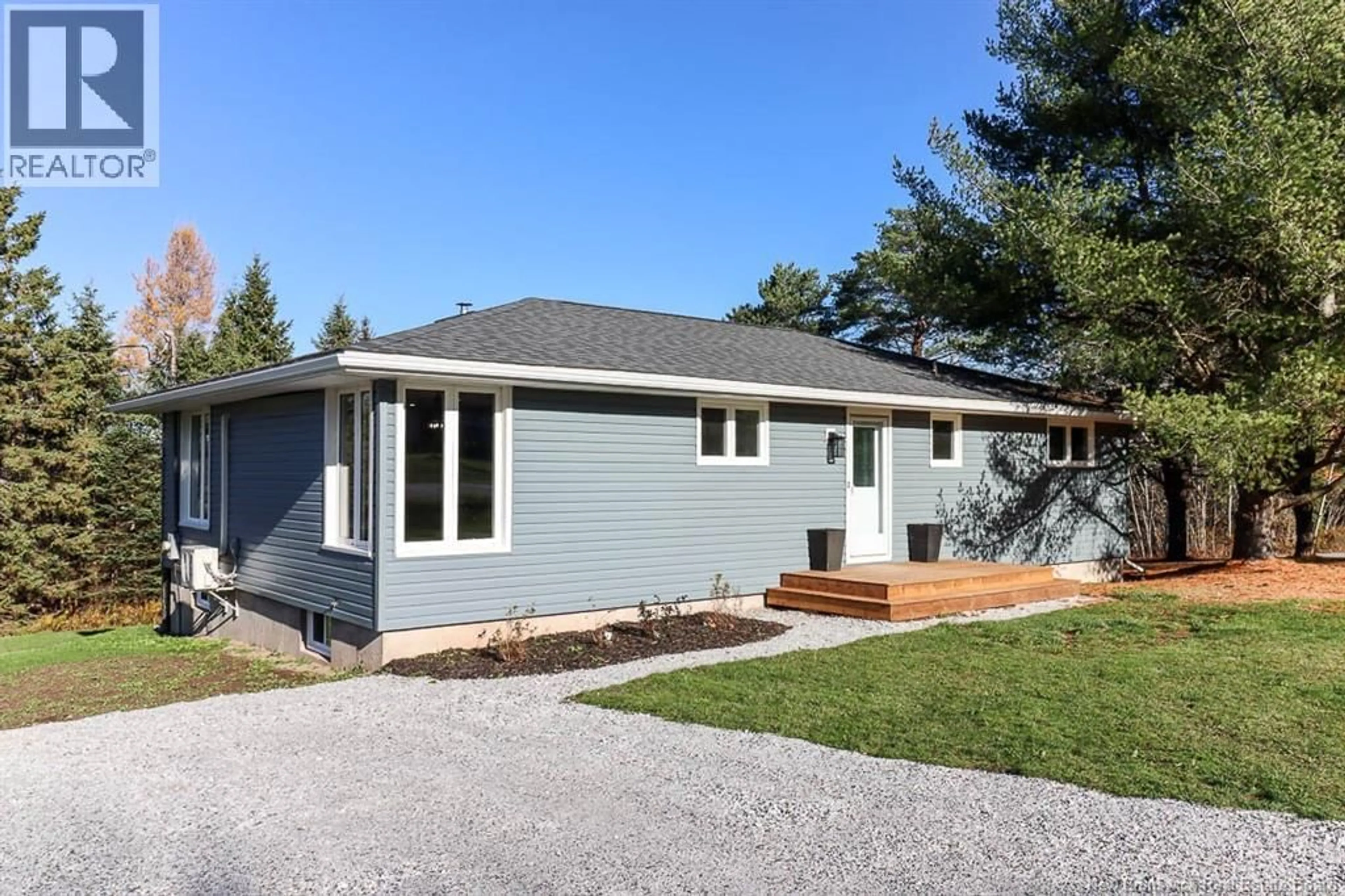 Home with vinyl exterior material, street for 2 YOUNG ROAD, Nauwigewauk New Brunswick E5N6V5