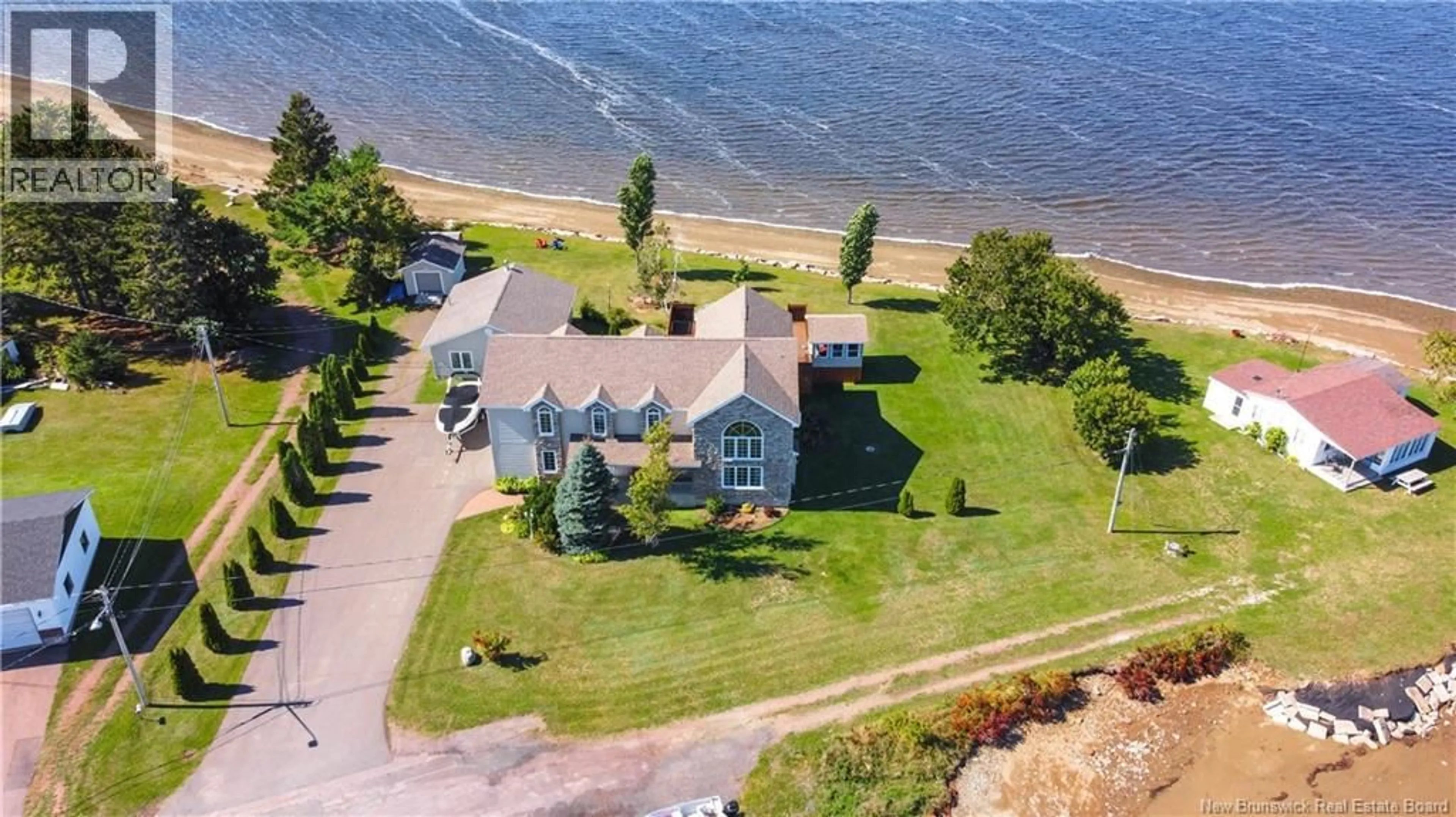 A pic from outside/outdoor area/front of a property/back of a property/a pic from drone, water/lake/river/ocean view for 79 POINTE DU MIRAGE, Aldouane New Brunswick E4W5C7