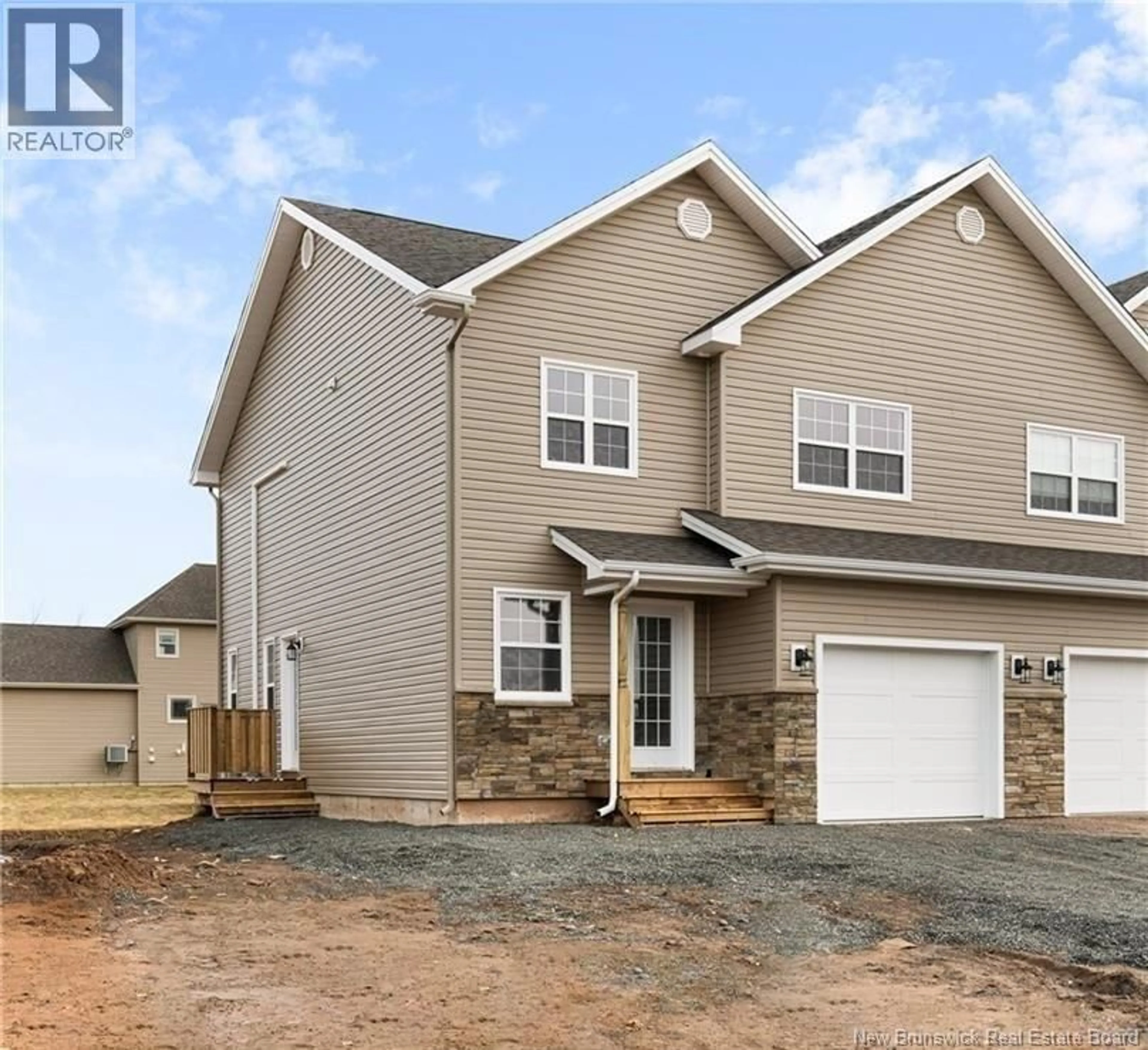 Home with vinyl exterior material, street for 103 ROCHEFORT, Dieppe New Brunswick E1A6X9