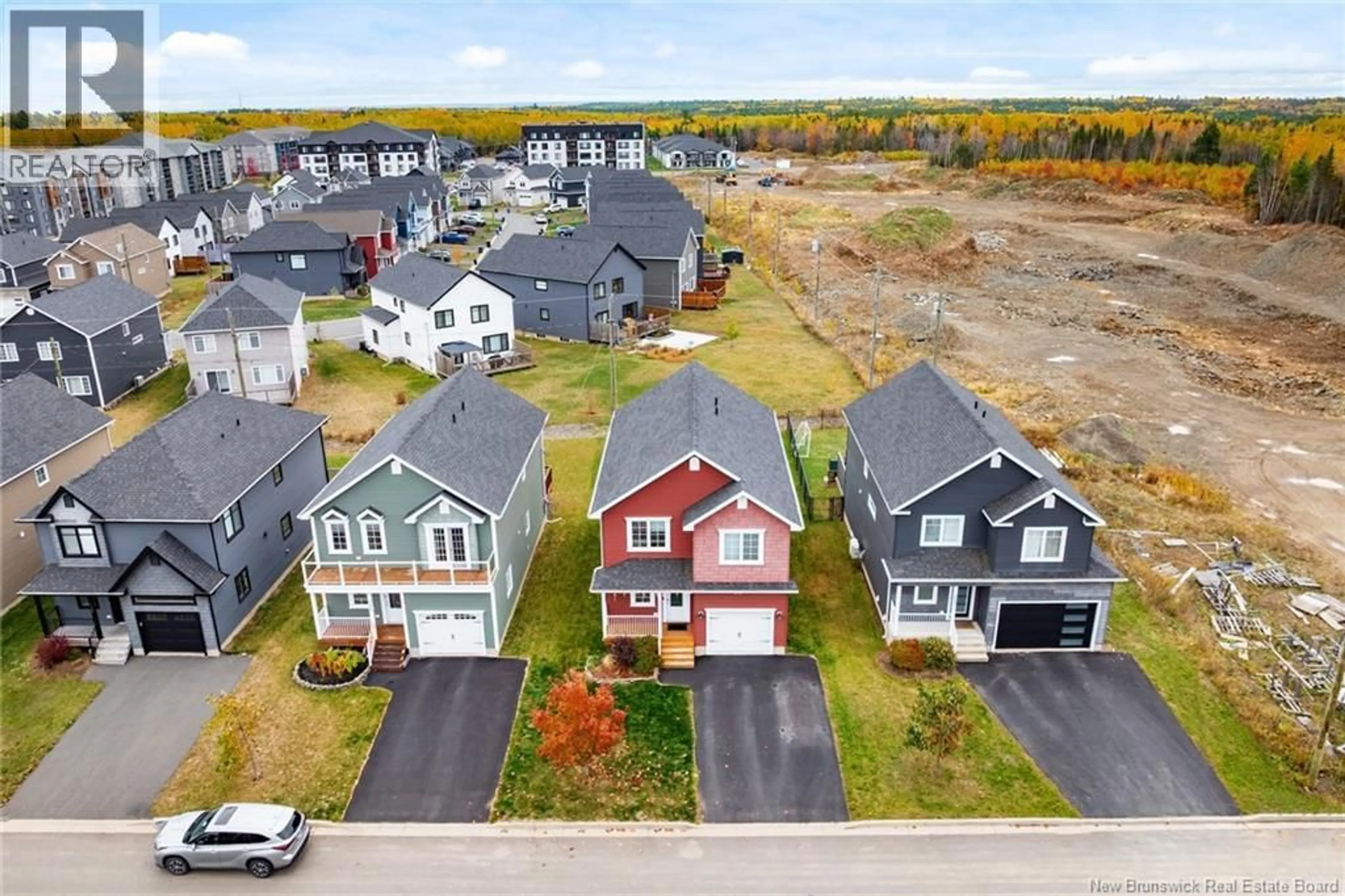 A pic from outside/outdoor area/front of a property/back of a property/a pic from drone, street for 151 LANGILLE DRIVE, Fredericton New Brunswick E3C0N3