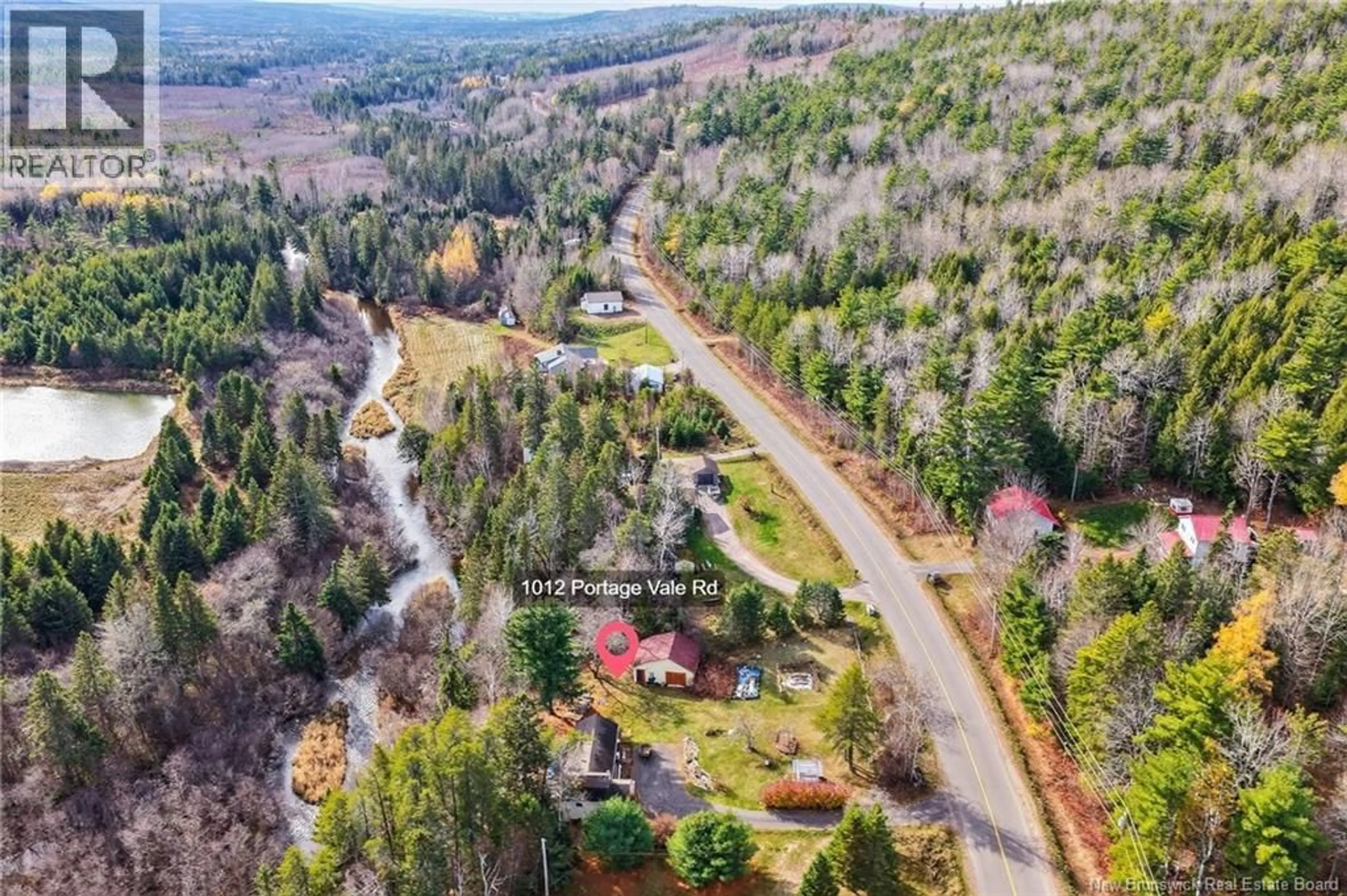 A pic from outside/outdoor area/front of a property/back of a property/a pic from drone, forest/trees view for 1012 PORTAGE VALE ROAD, Portage Vale New Brunswick E4Z3E4