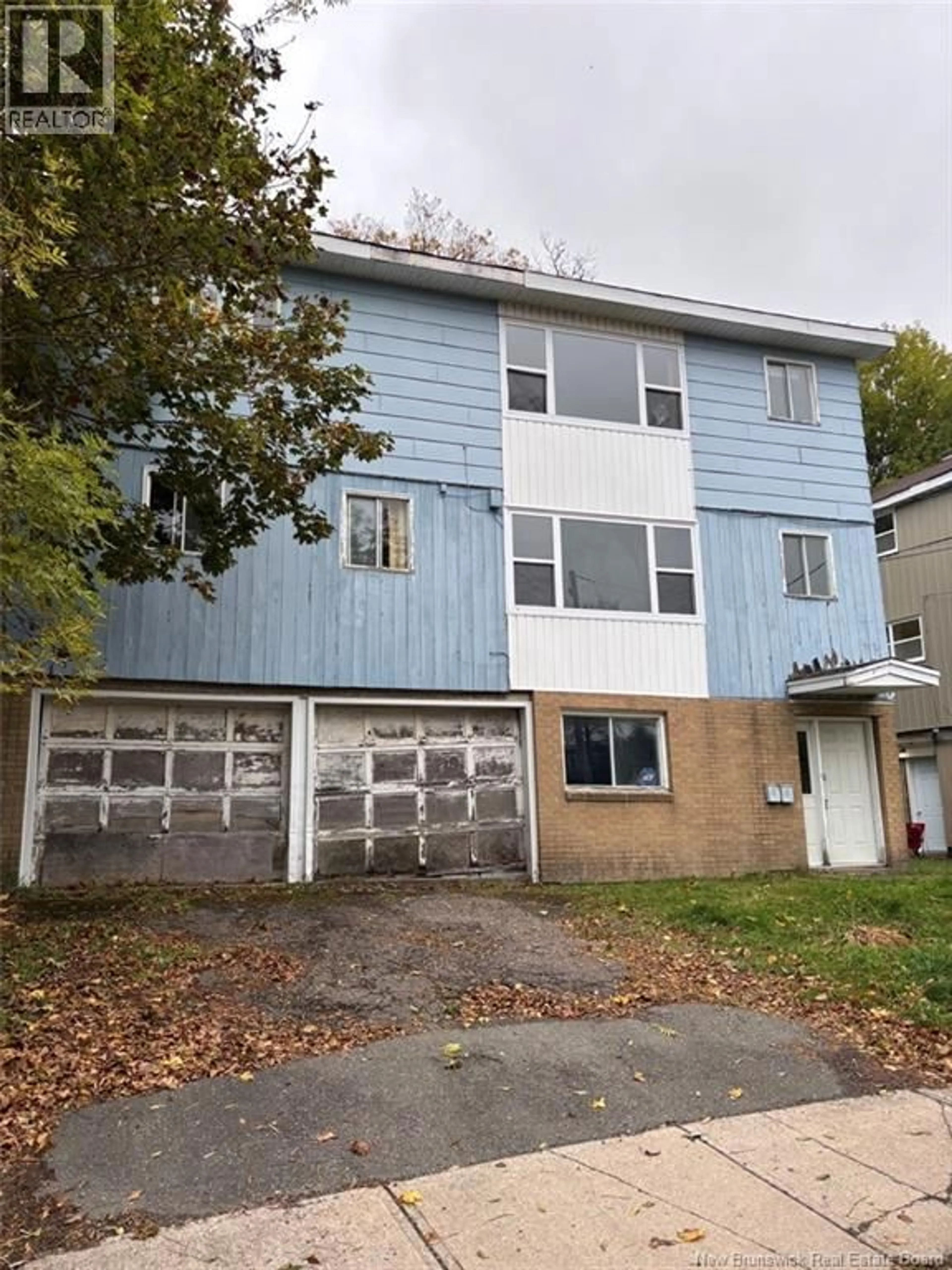 Home with vinyl exterior material, street for 21/23 CEDAR GROVE CRESCENT, Saint John New Brunswick E2K4G5