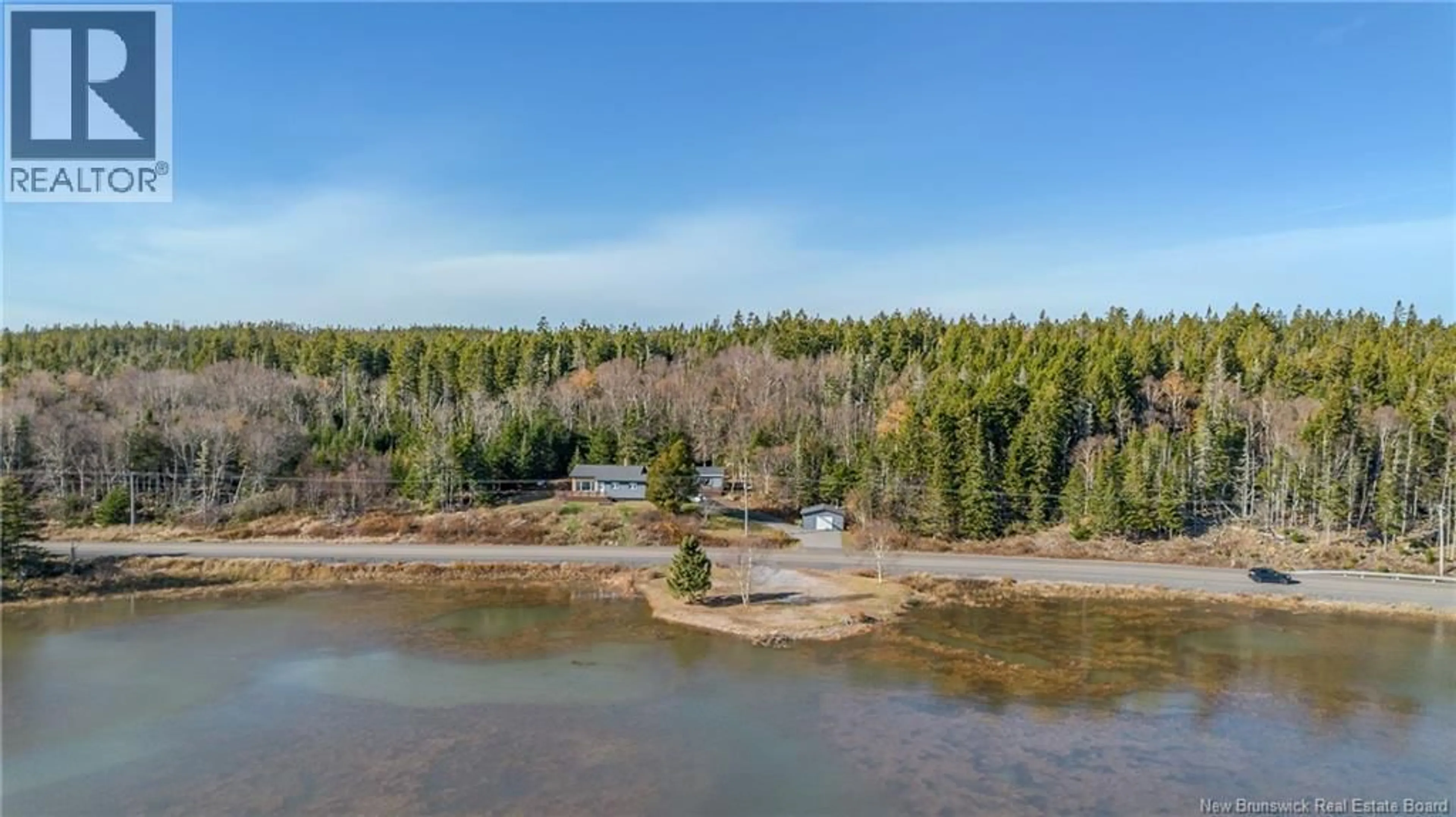A pic from outside/outdoor area/front of a property/back of a property/a pic from drone, water/lake/river/ocean view for 2025 790 ROUTE ROUTE, Chance Harbour New Brunswick E5J1Y6
