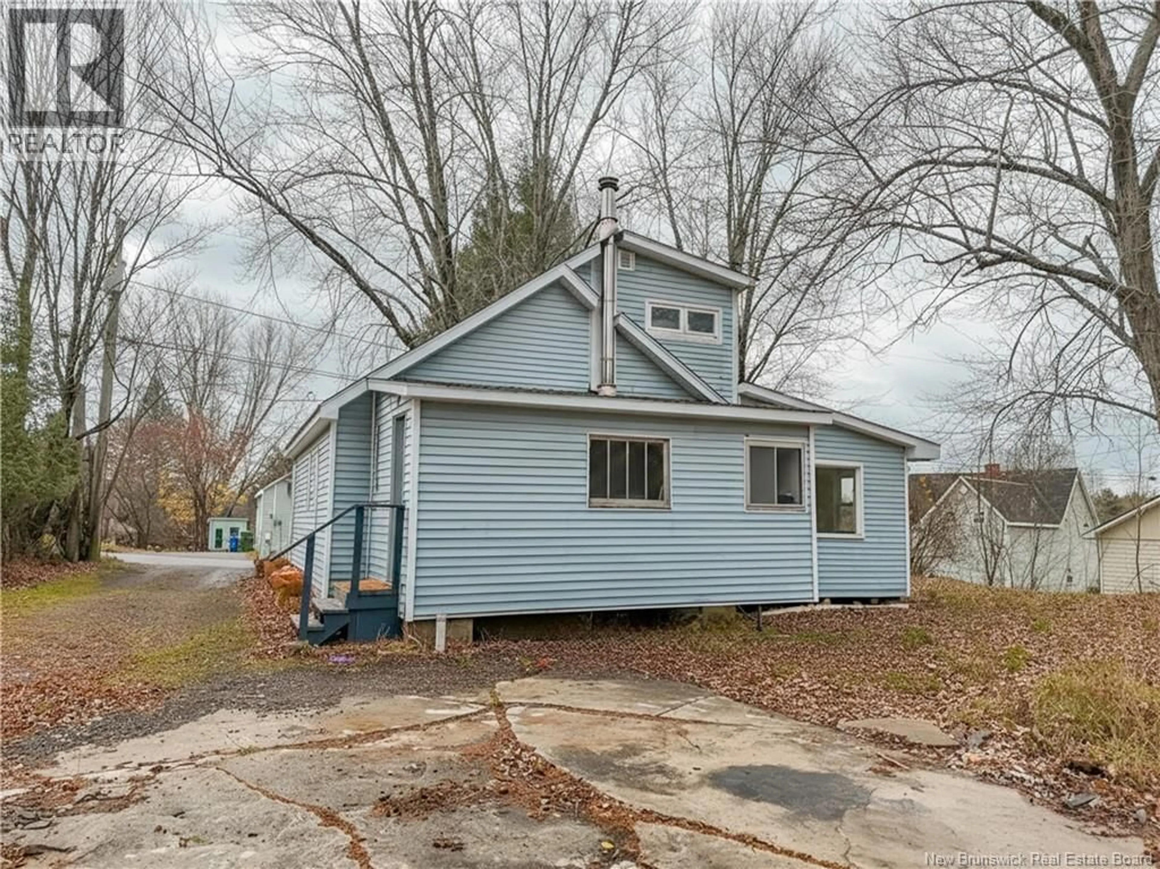 Home with vinyl exterior material, street for 57 FISHER AVENUE, Fredericton New Brunswick E3A4J1