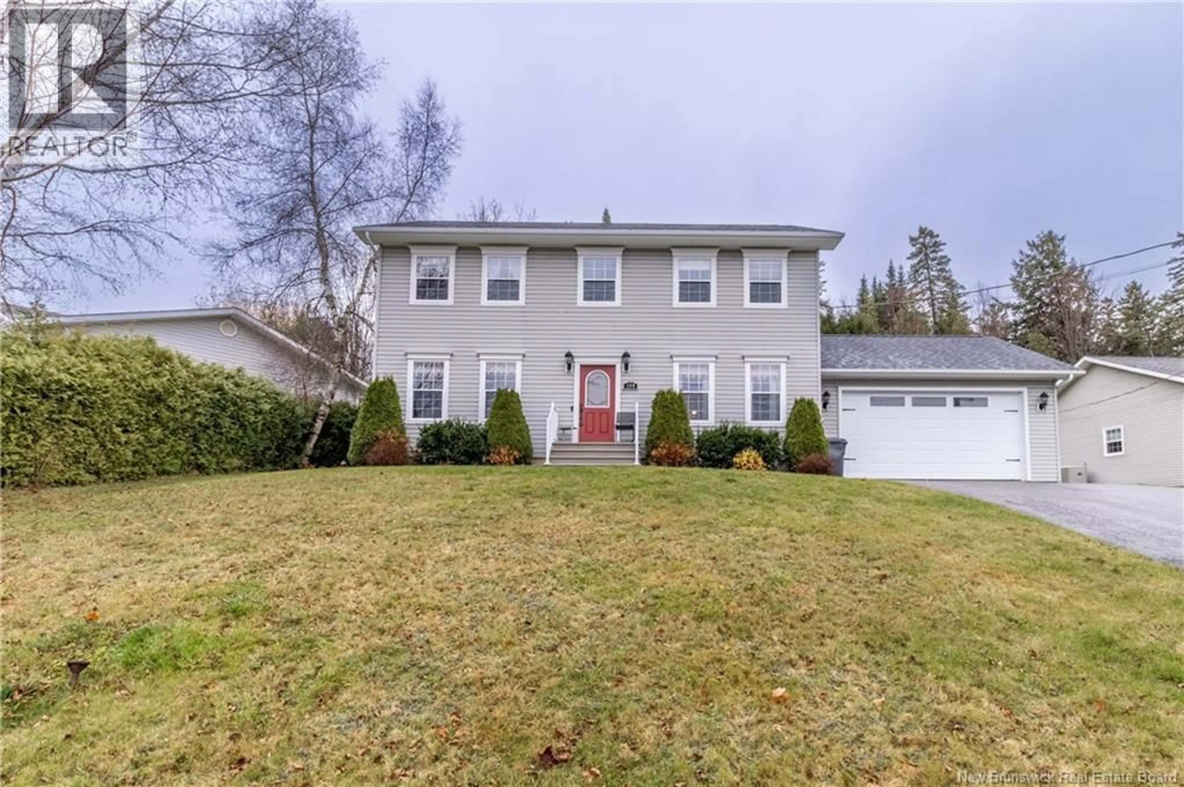 Home with vinyl exterior material, street for 169 EASTWOOD DRIVE, Woodstock New Brunswick E7M3Z4