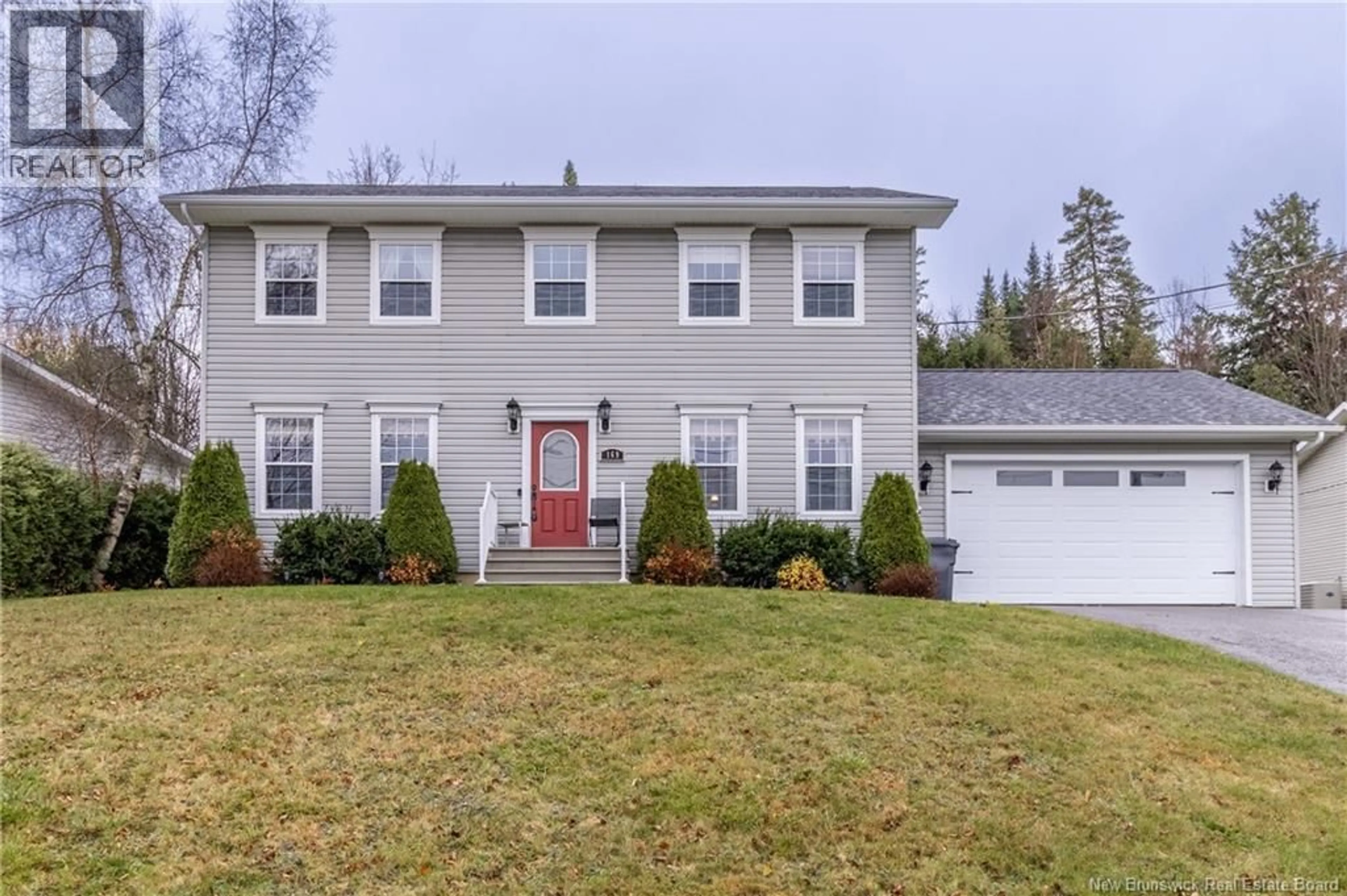 Home with vinyl exterior material, street for 169 EASTWOOD DRIVE, Woodstock New Brunswick E7M3Z4