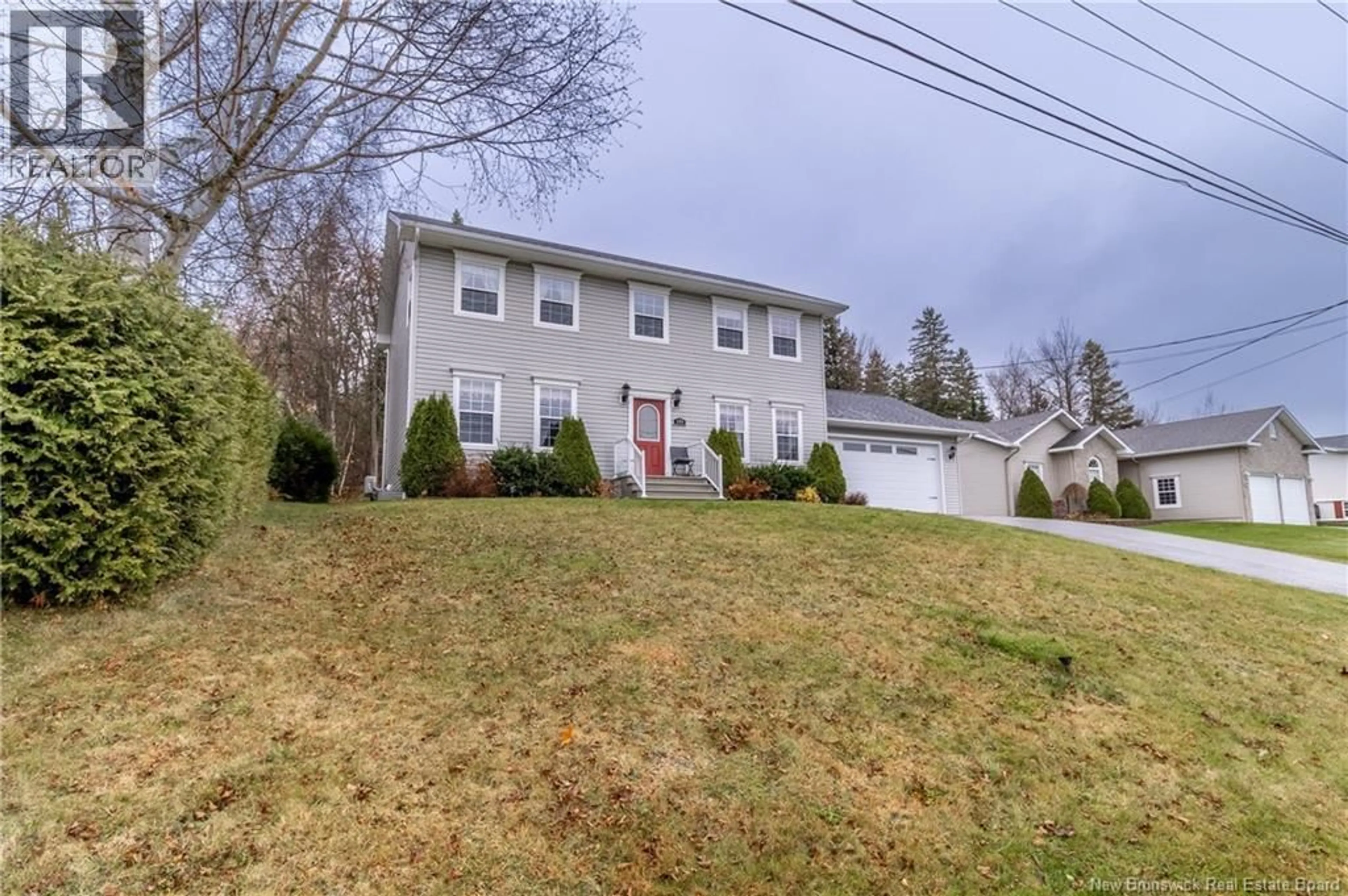 Home with vinyl exterior material, street for 169 EASTWOOD DRIVE, Woodstock New Brunswick E7M3Z4