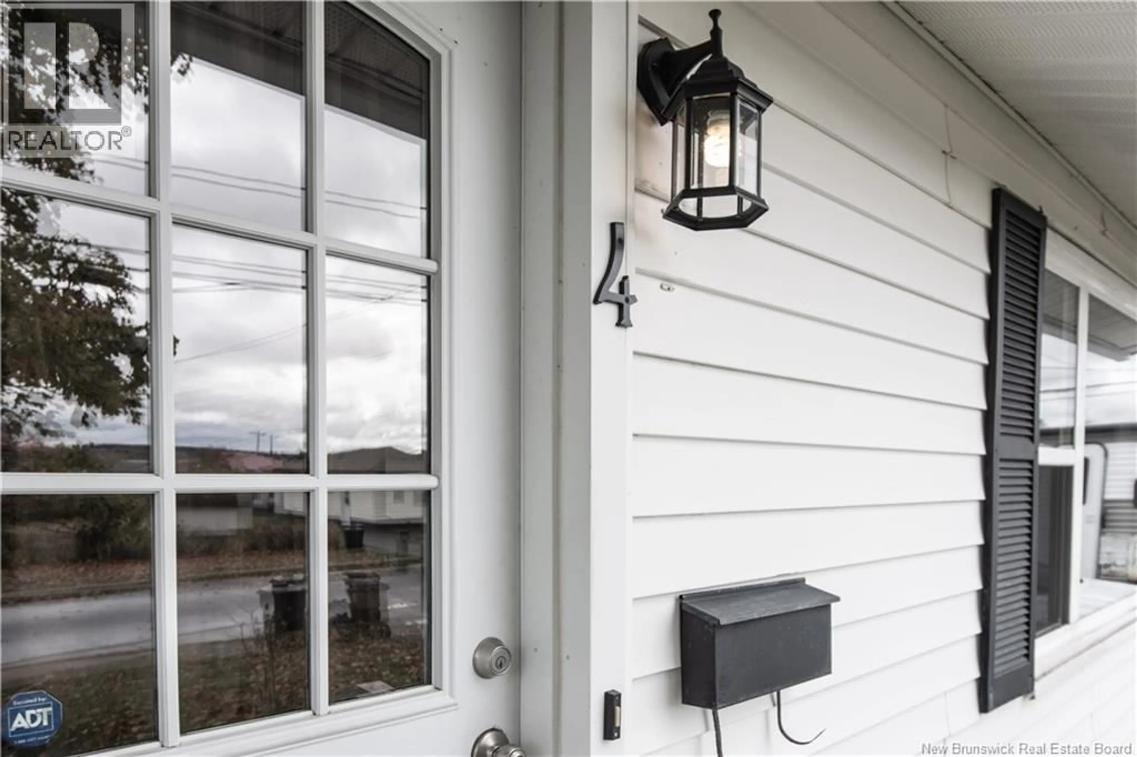 Home with vinyl exterior material, street for 4 BYRON STREET, Saint John New Brunswick E2J2T8