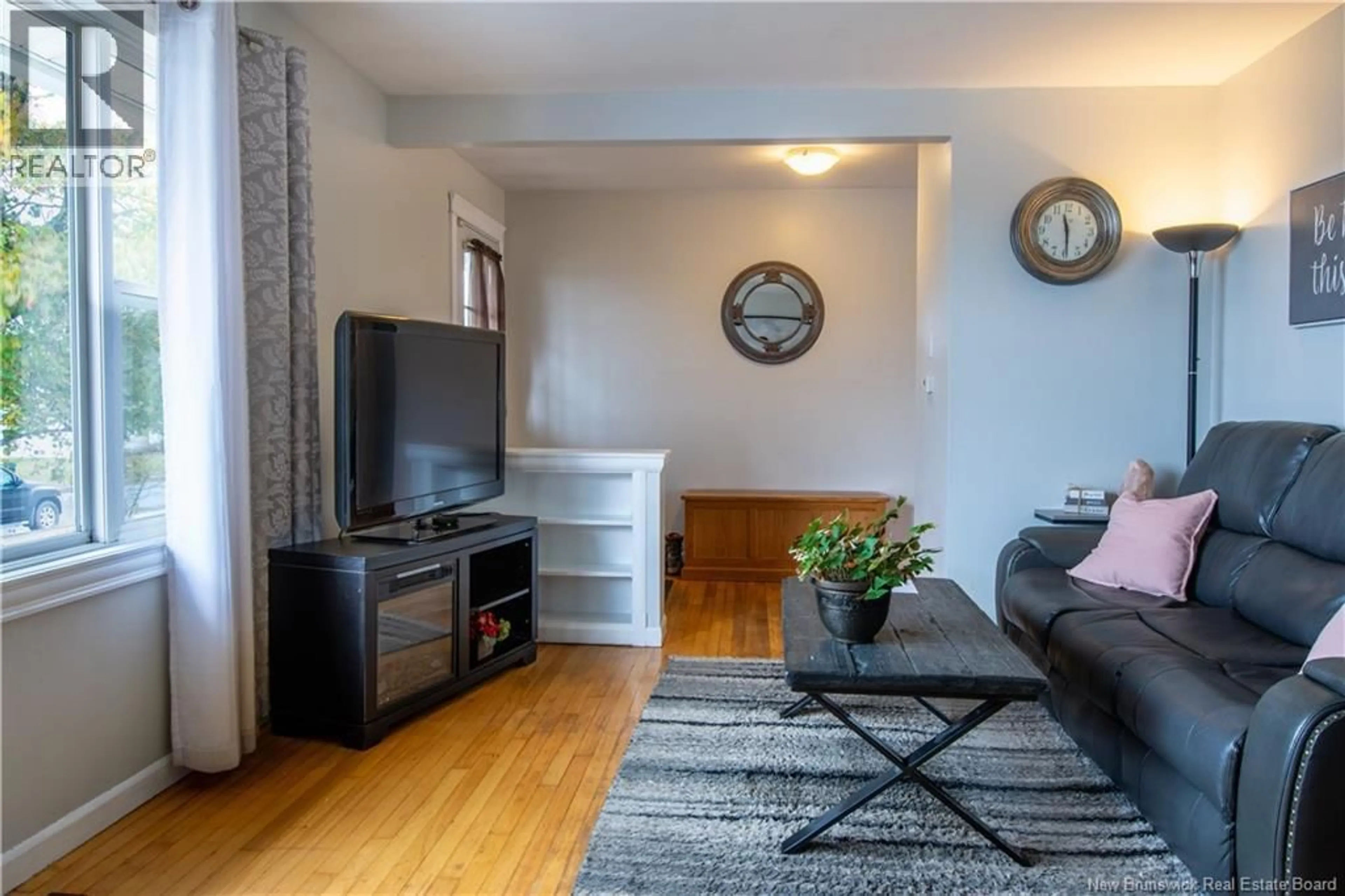 Living room with furniture, wood/laminate floor for 4 BYRON STREET, Saint John New Brunswick E2J2T8