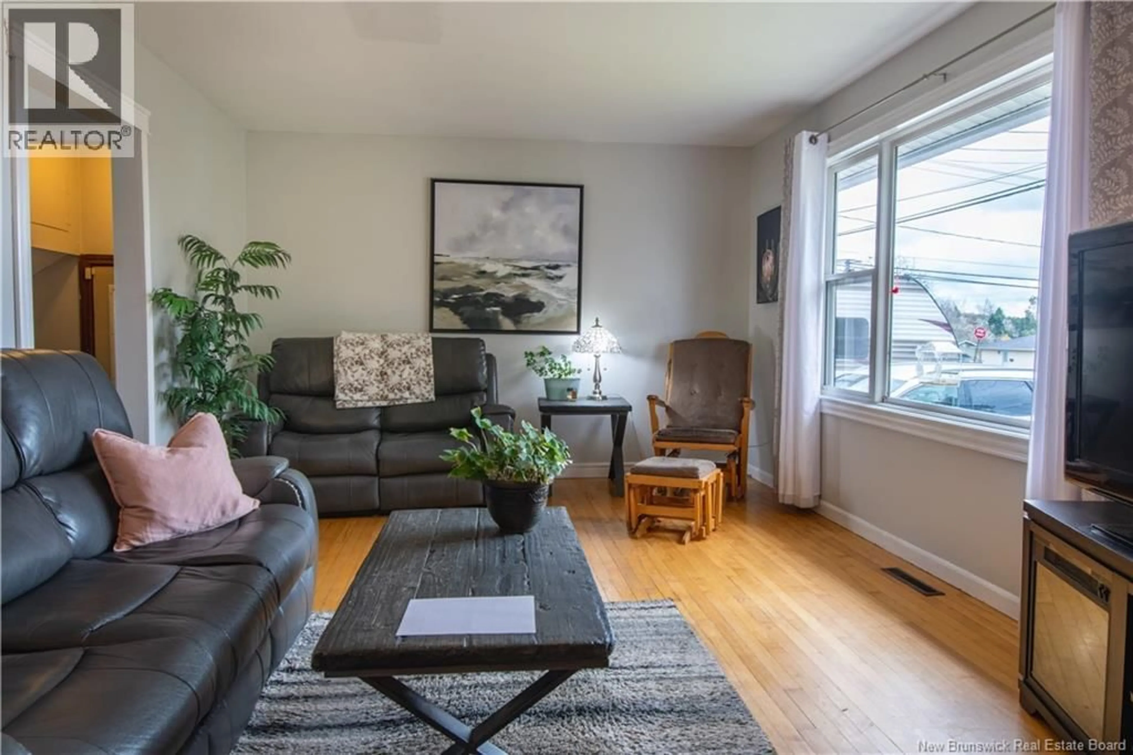 Living room with furniture, wood/laminate floor for 4 BYRON STREET, Saint John New Brunswick E2J2T8