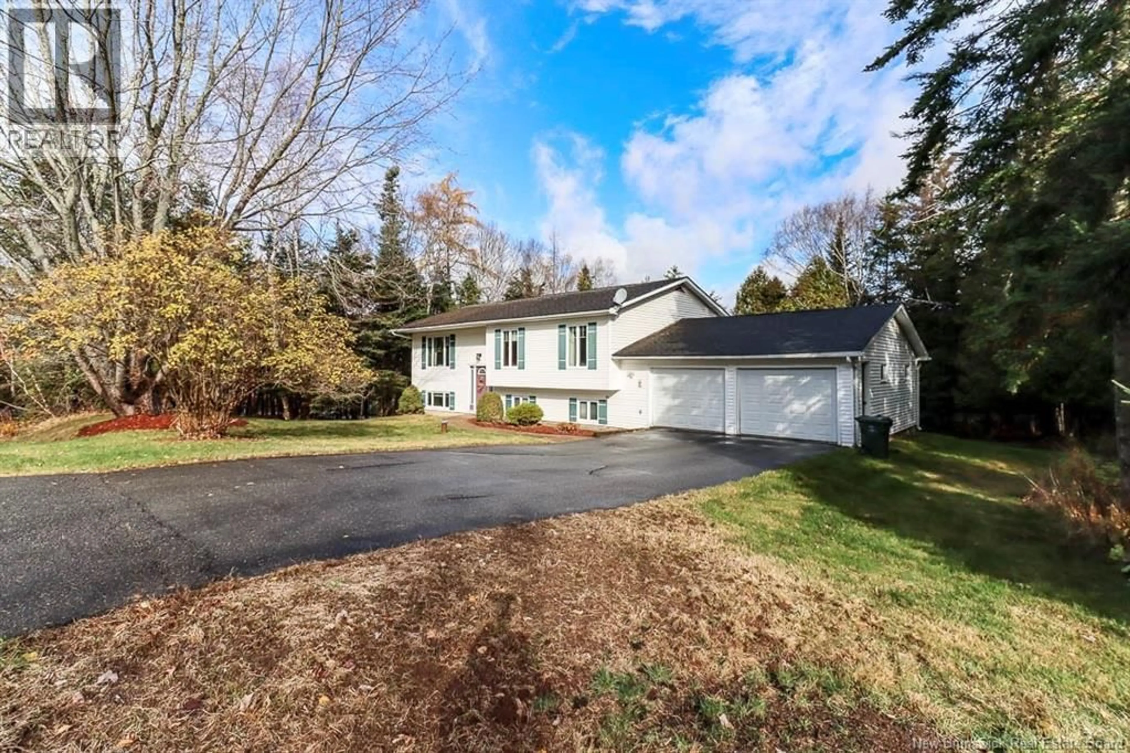 A pic from outside/outdoor area/front of a property/back of a property/a pic from drone, street for 8 PARKWOOD DRIVE, Quispamsis New Brunswick E2E1P3