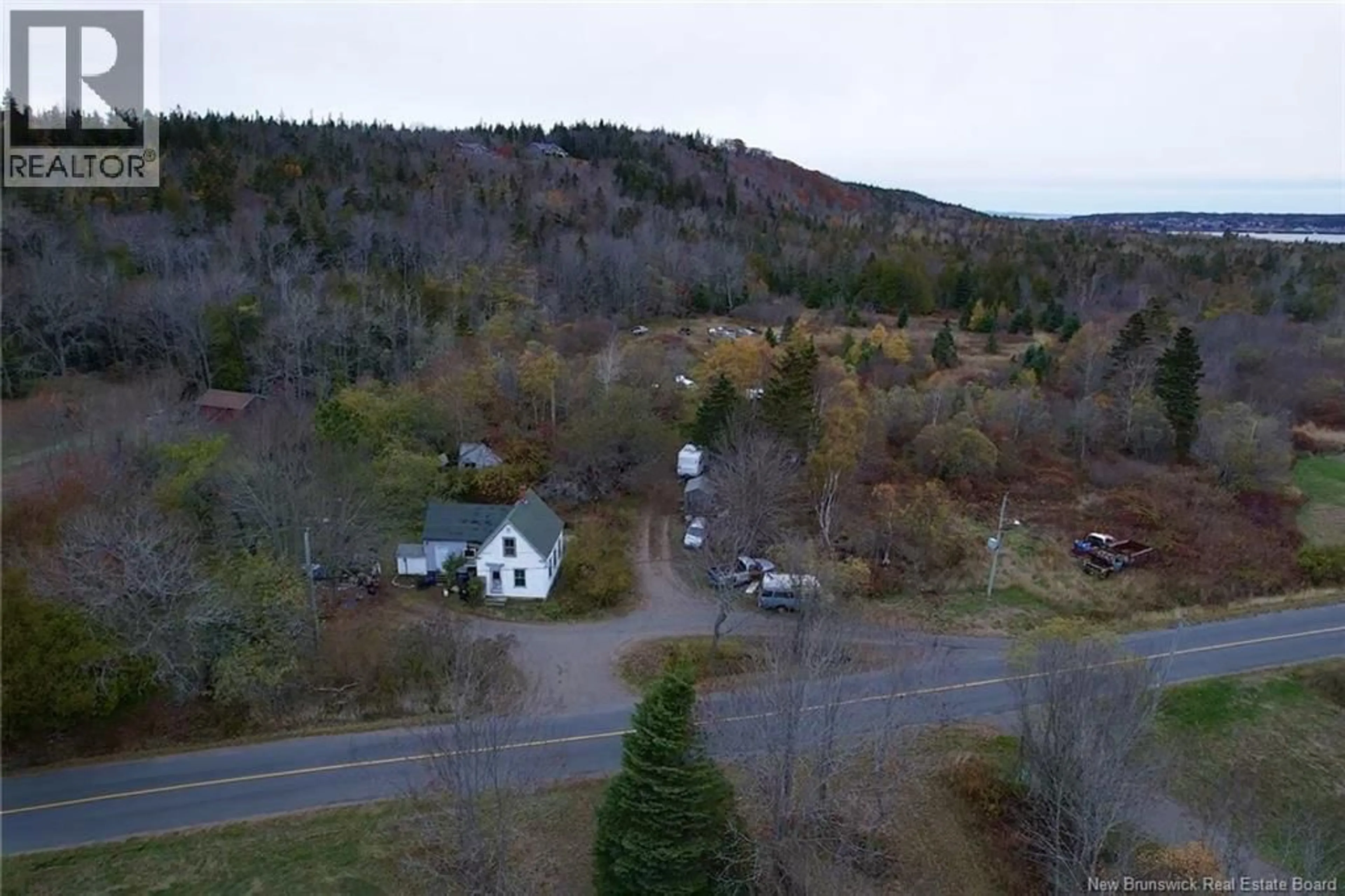 A pic from outside/outdoor area/front of a property/back of a property/a pic from drone, unknown for 90 CEDAR STREET, Grand Manan New Brunswick E5G2C2