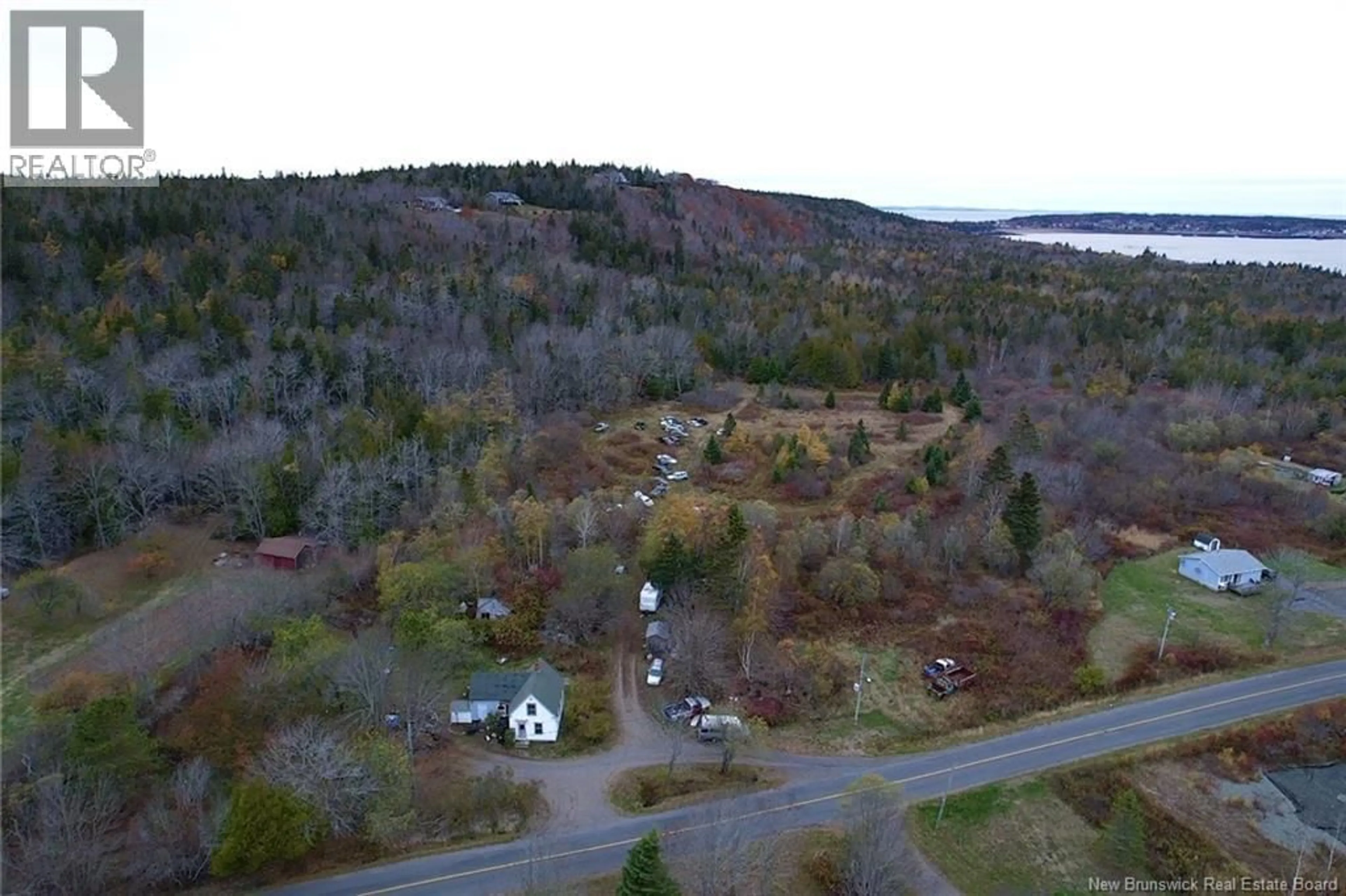 A pic from outside/outdoor area/front of a property/back of a property/a pic from drone, unknown for 90 CEDAR STREET, Grand Manan New Brunswick E5G2C2