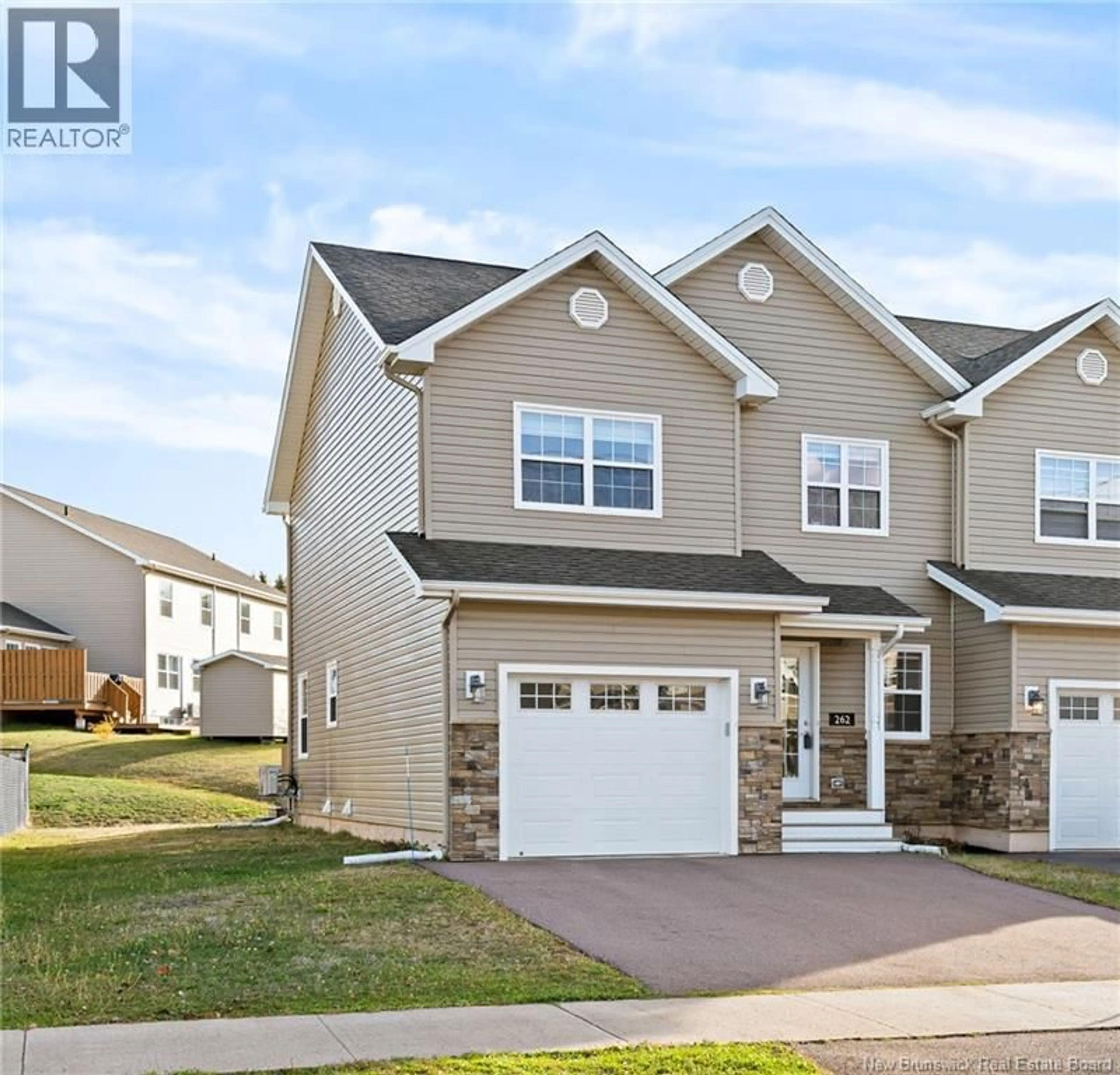 Home with vinyl exterior material, street for 262 DOLBEAU, Dieppe New Brunswick E1A1R6
