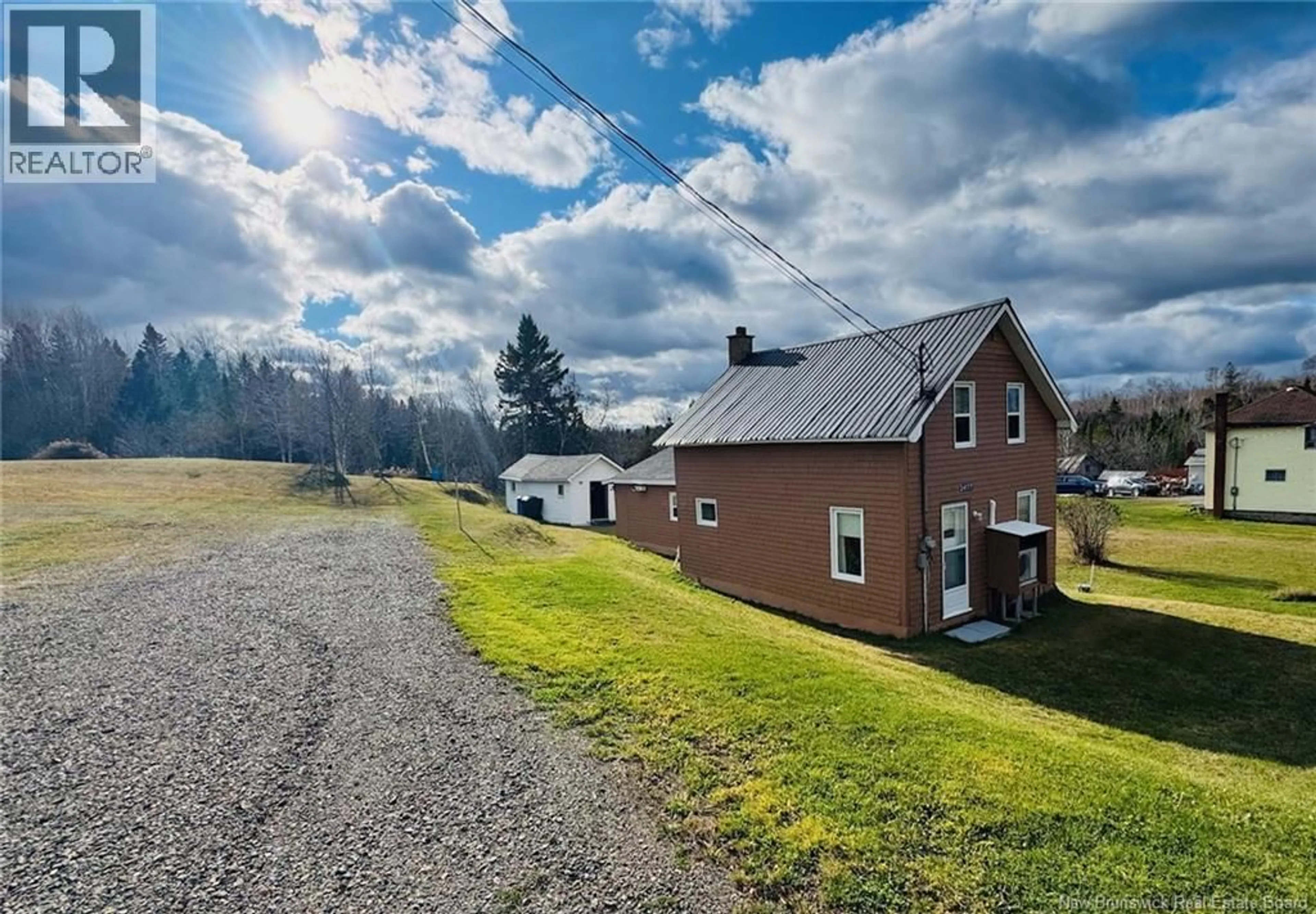 A pic from outside/outdoor area/front of a property/back of a property/a pic from drone, street for 24177 134 ROUTE, Benjamin River New Brunswick E8G1P4