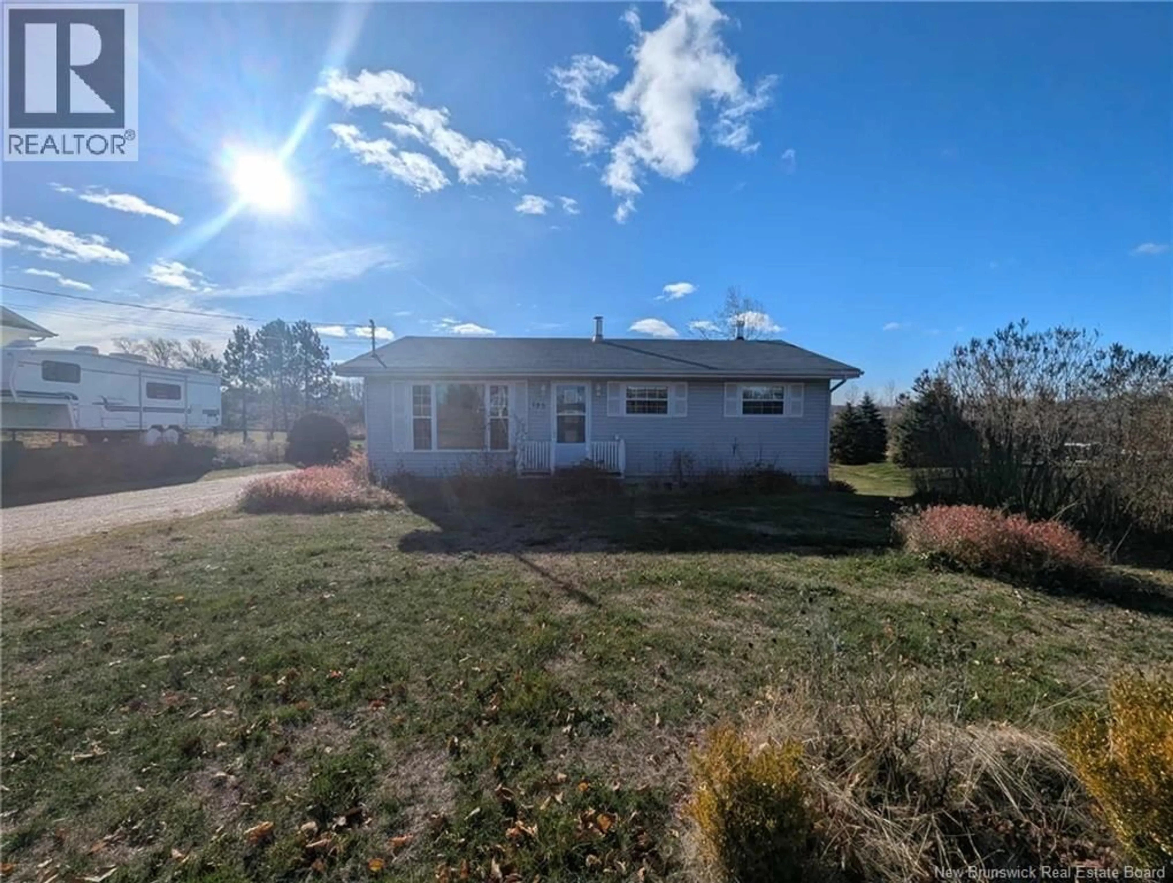 A pic from outside/outdoor area/front of a property/back of a property/a pic from drone, unknown for 185 SMITH, Big River New Brunswick E2A6S7