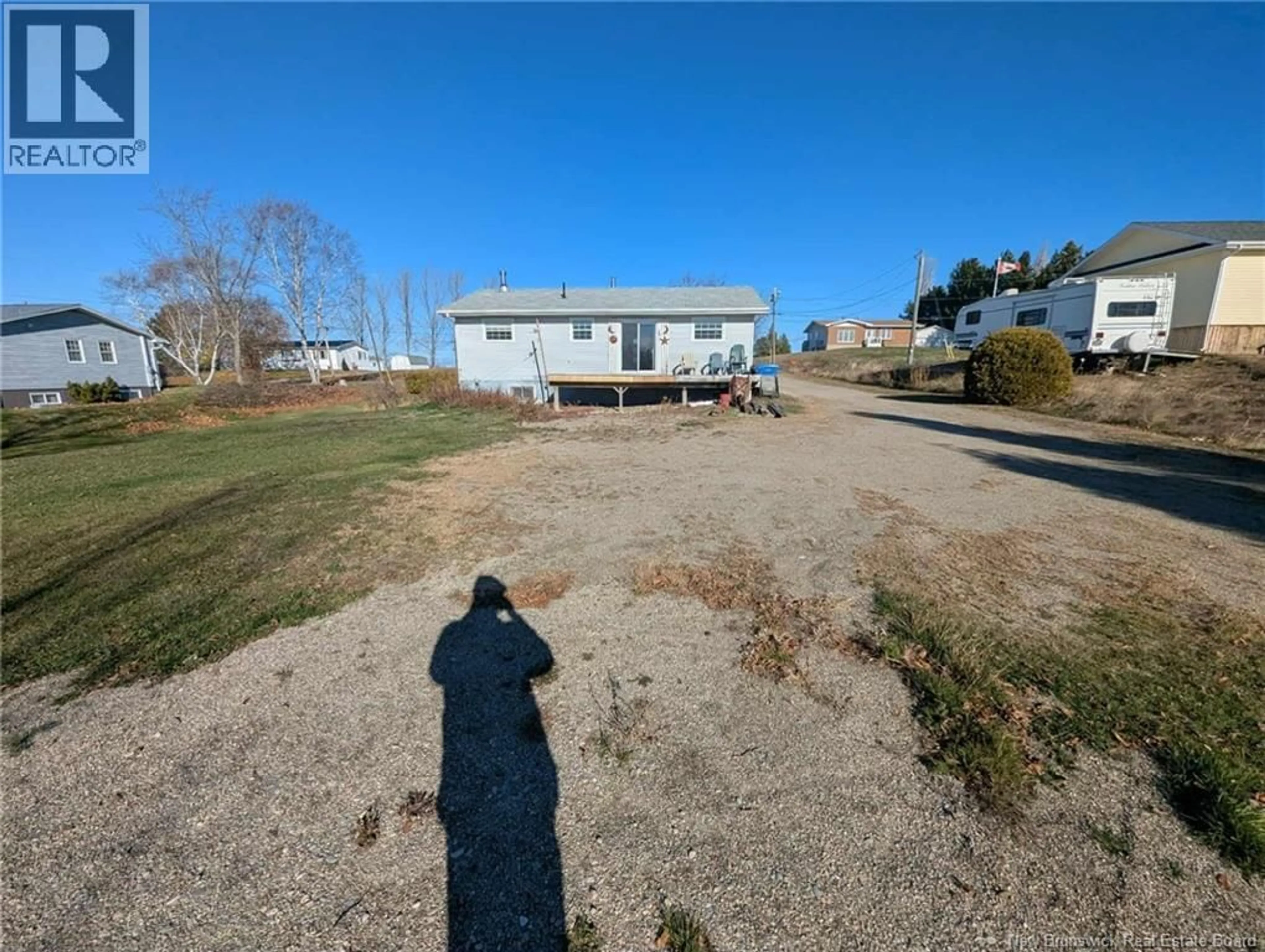 A pic from outside/outdoor area/front of a property/back of a property/a pic from drone, unknown for 185 SMITH, Big River New Brunswick E2A6S7