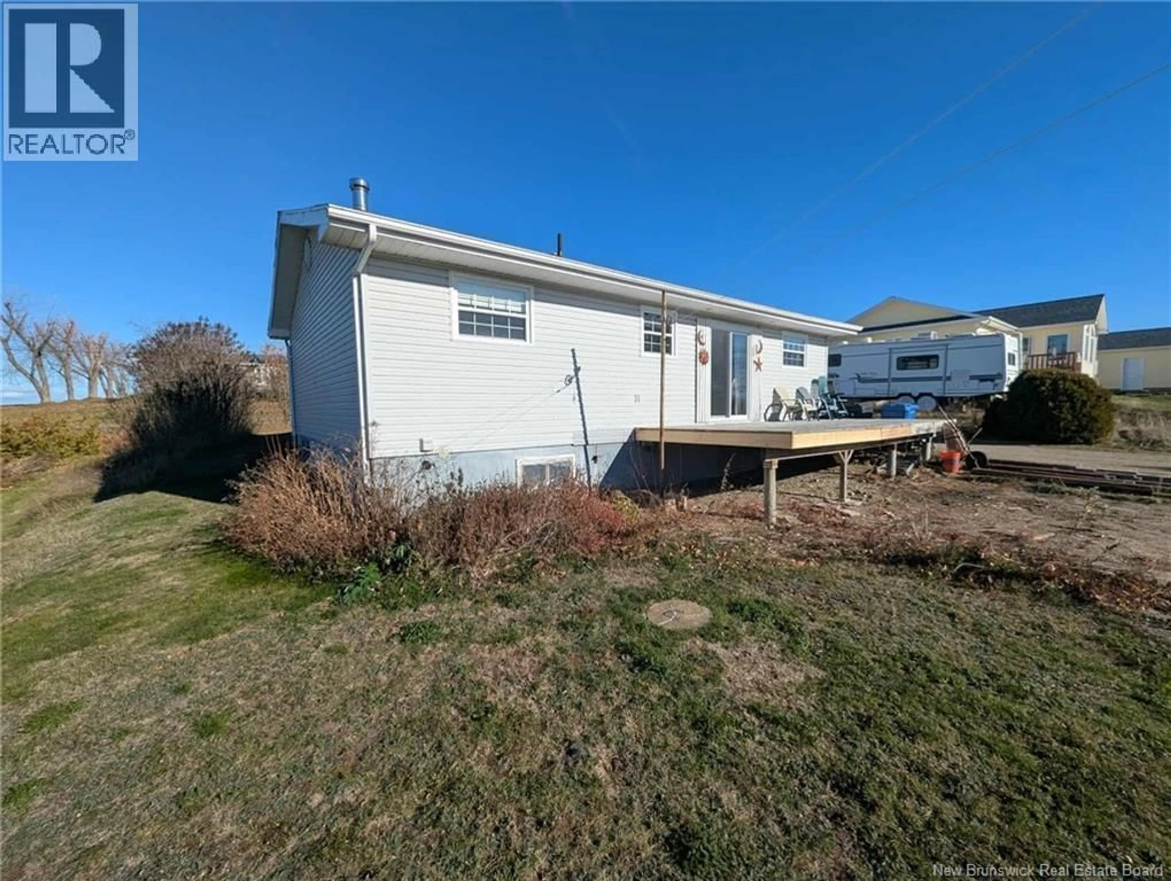 A pic from outside/outdoor area/front of a property/back of a property/a pic from drone, water/lake/river/ocean view for 185 SMITH, Big River New Brunswick E2A6S7