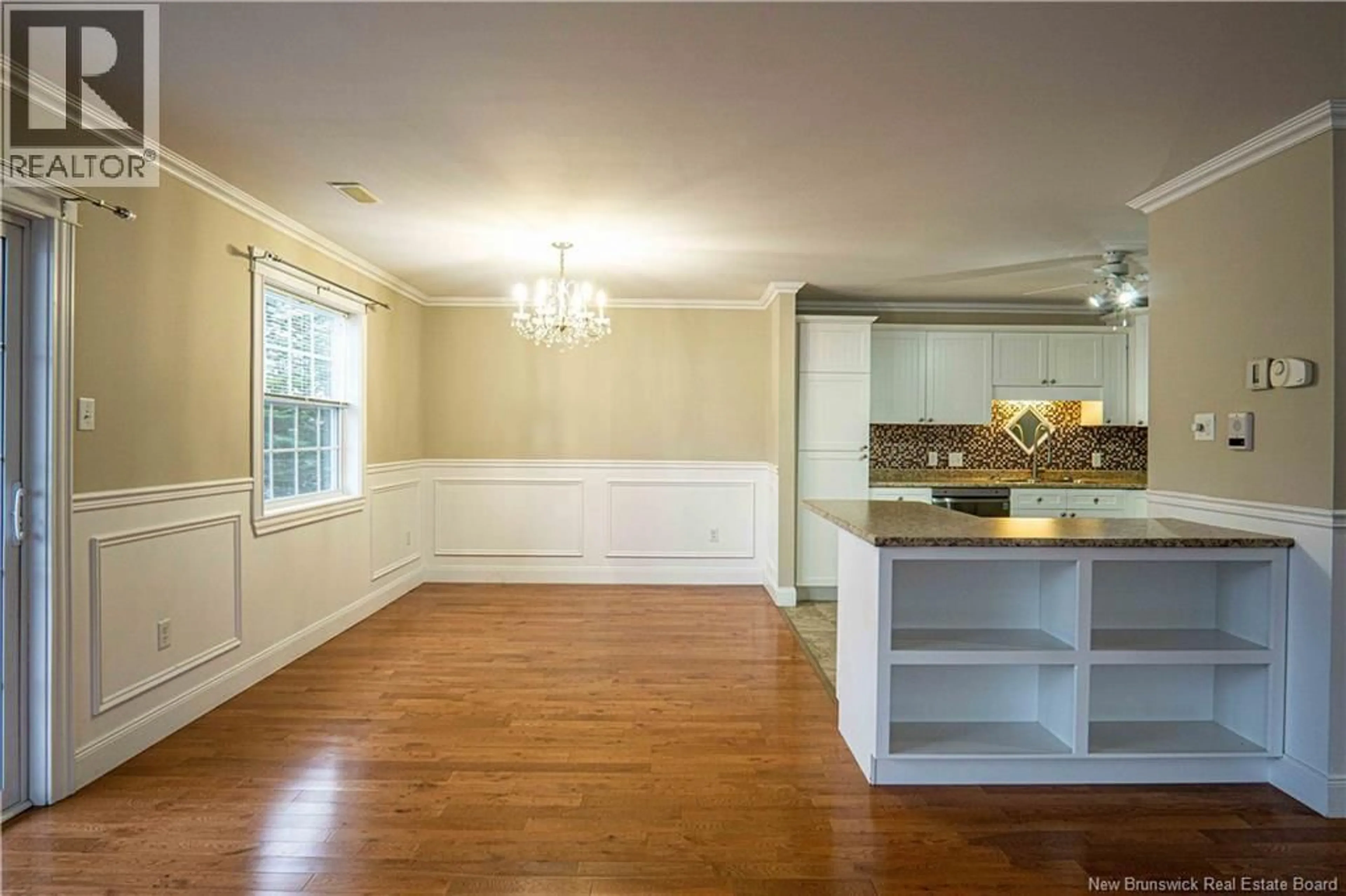 Open concept kitchen, wood/laminate floor for 210 - 40 BROWN BOULEVARD, Fredericton New Brunswick E3A0L7