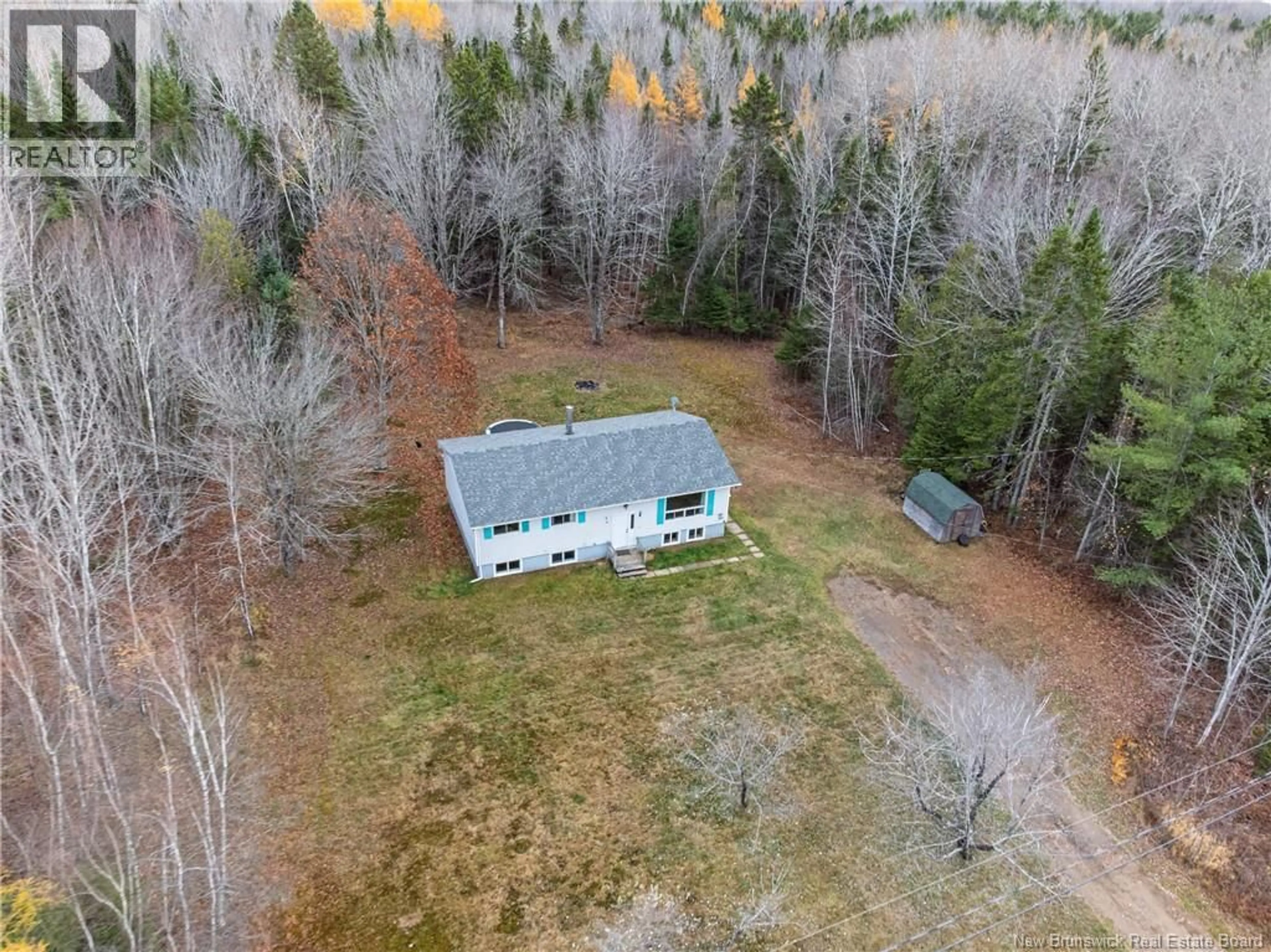 A pic from outside/outdoor area/front of a property/back of a property/a pic from drone, forest/trees view for 1180 ROUTE 690, Maquapit Lake New Brunswick E4B1R2