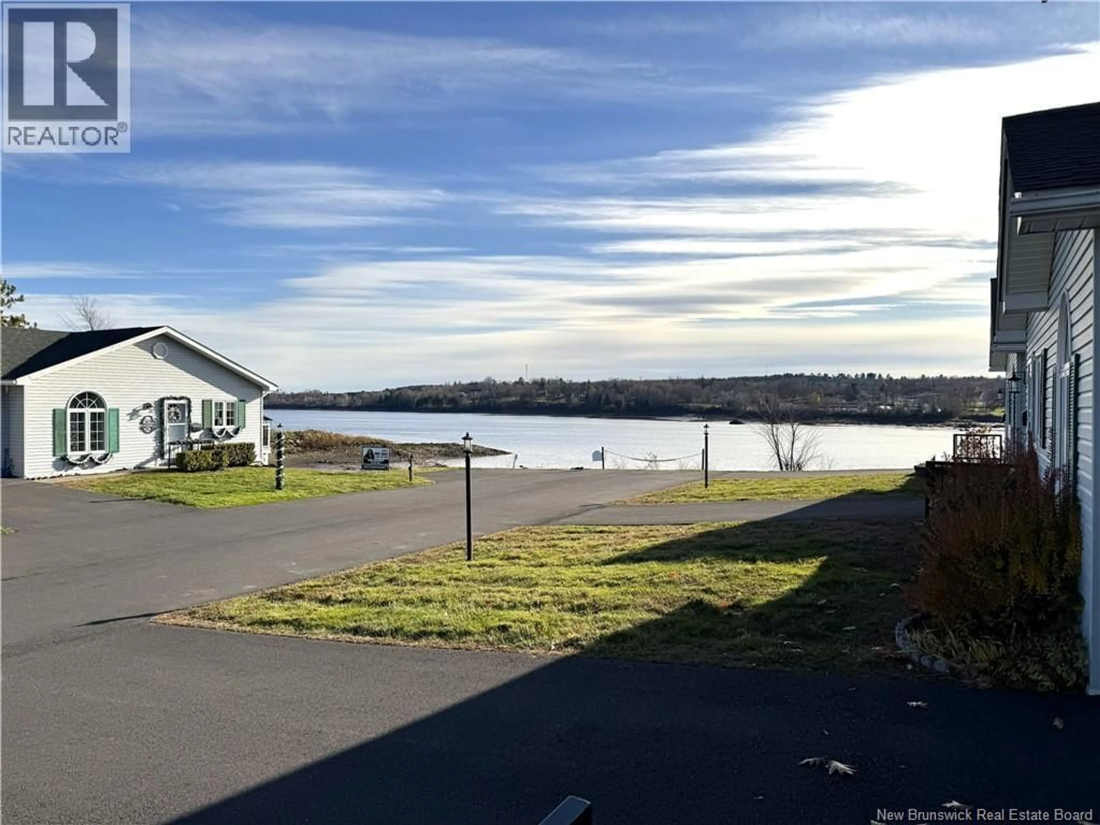 A pic from outside/outdoor area/front of a property/back of a property/a pic from drone, water/lake/river/ocean view for F - 61 PRINCE WILLIAM STREET, St. Stephen New Brunswick E3L1S5