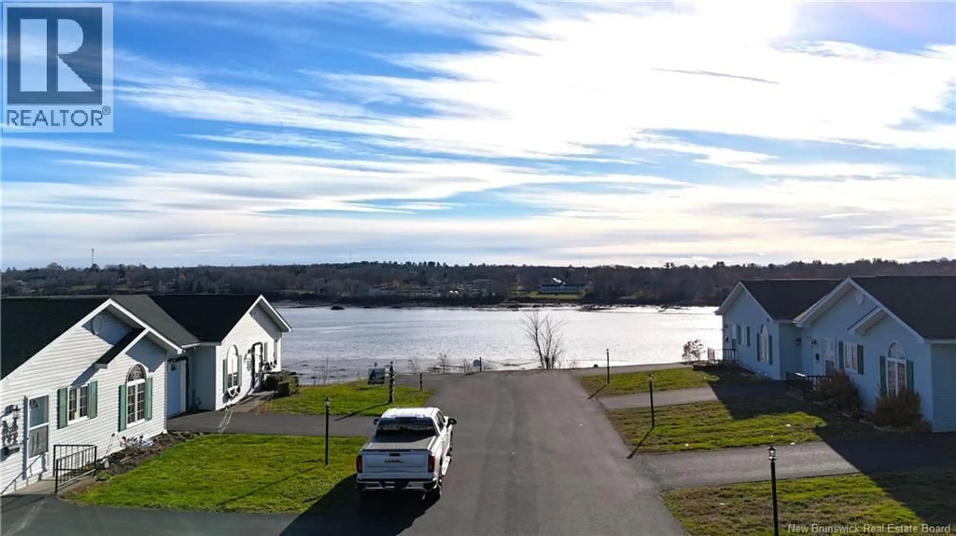 A pic from outside/outdoor area/front of a property/back of a property/a pic from drone, water/lake/river/ocean view for F - 61 PRINCE WILLIAM STREET, St. Stephen New Brunswick E3L1S5