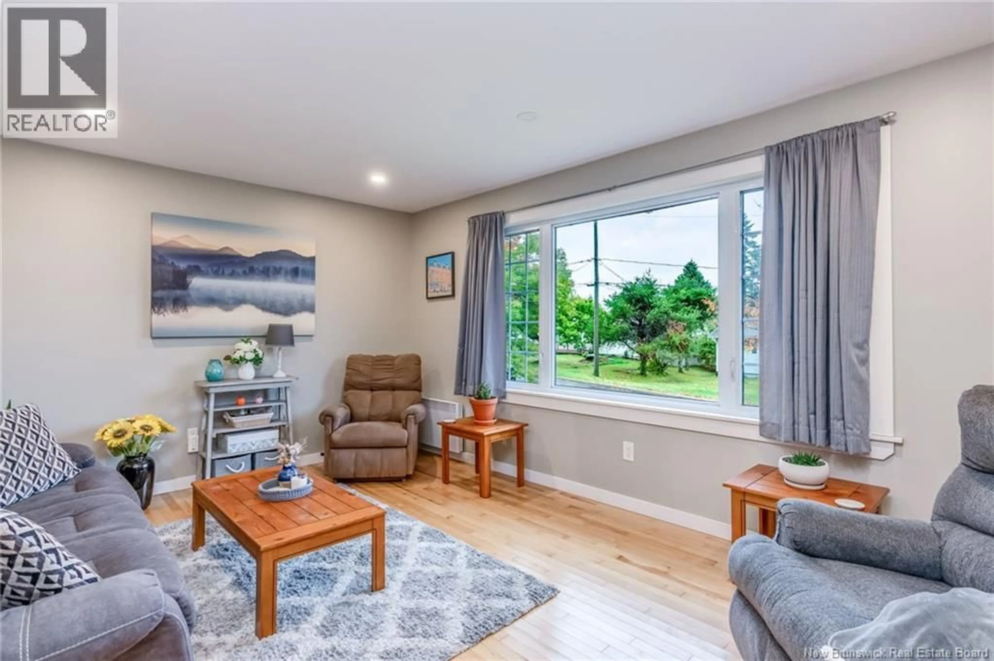 Living room with furniture, wood/laminate floor for 12 GERARD, Saint John New Brunswick E2J2V2