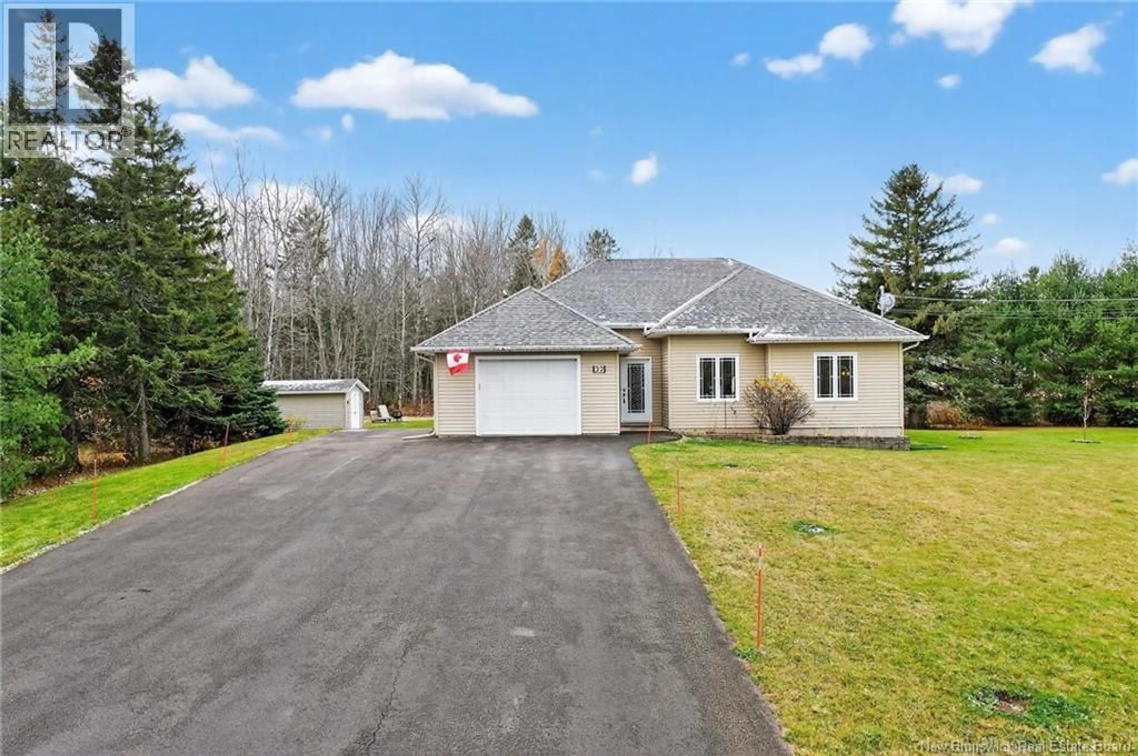 A pic from outside/outdoor area/front of a property/back of a property/a pic from drone, street for 32 MURRAY ROAD, Saint-Antoine New Brunswick E4V1A2