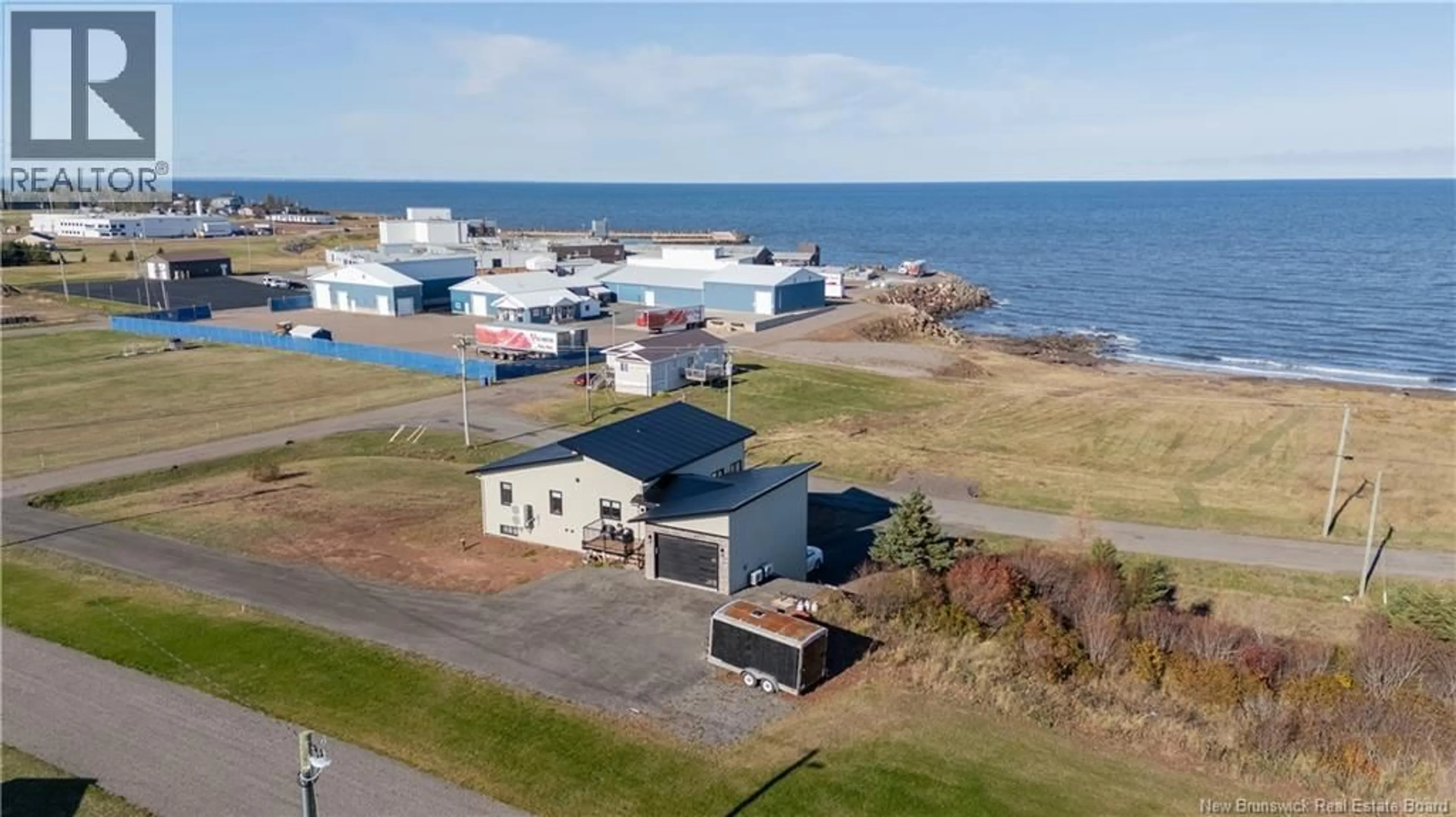 A pic from outside/outdoor area/front of a property/back of a property/a pic from drone, unknown for 5 ALLEE MACON, Bas Cap Pele New Brunswick E4N1X2