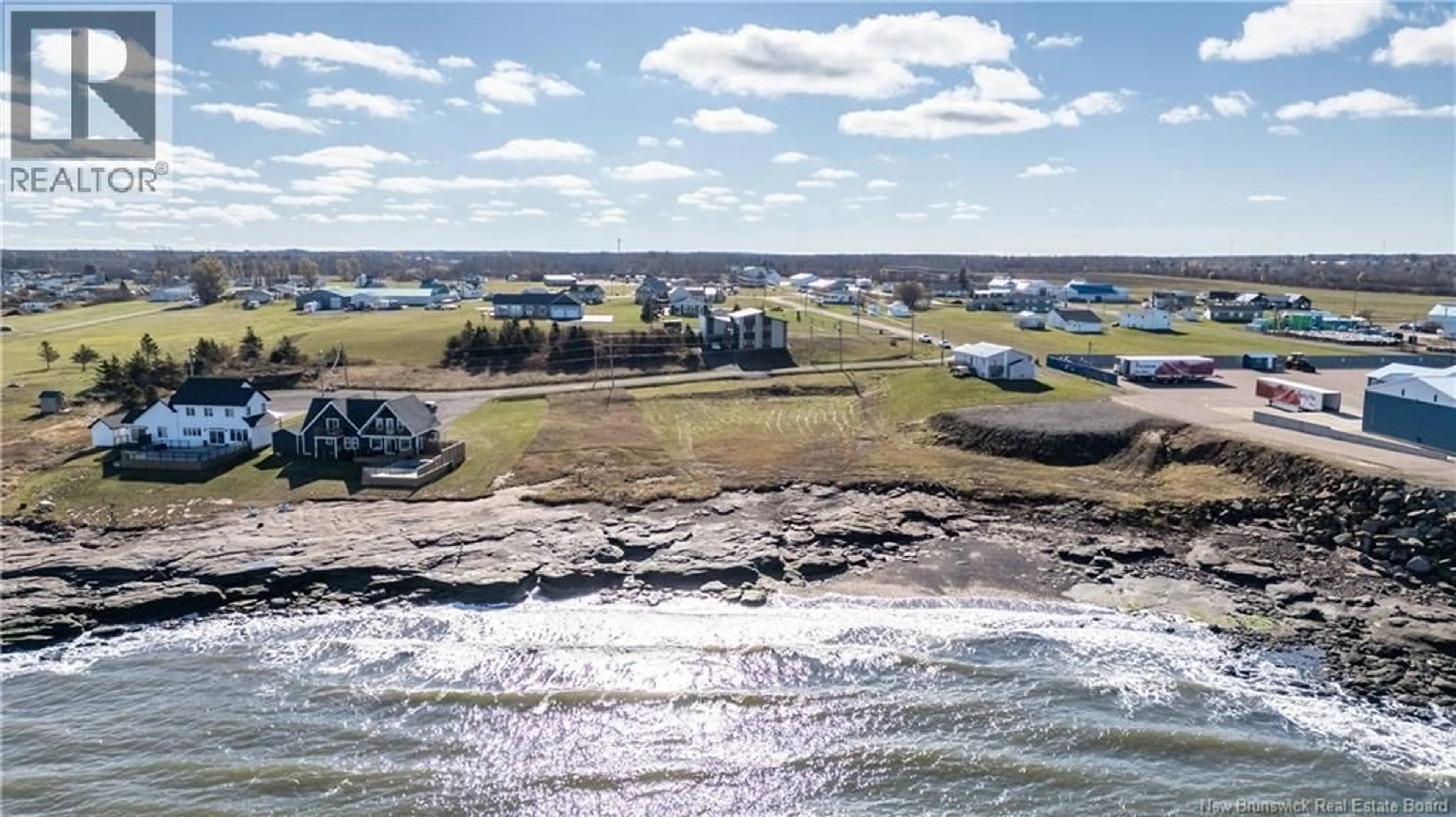A pic from outside/outdoor area/front of a property/back of a property/a pic from drone, water/lake/river/ocean view for 5 ALLEE MACON, Bas Cap Pele New Brunswick E4N1X2