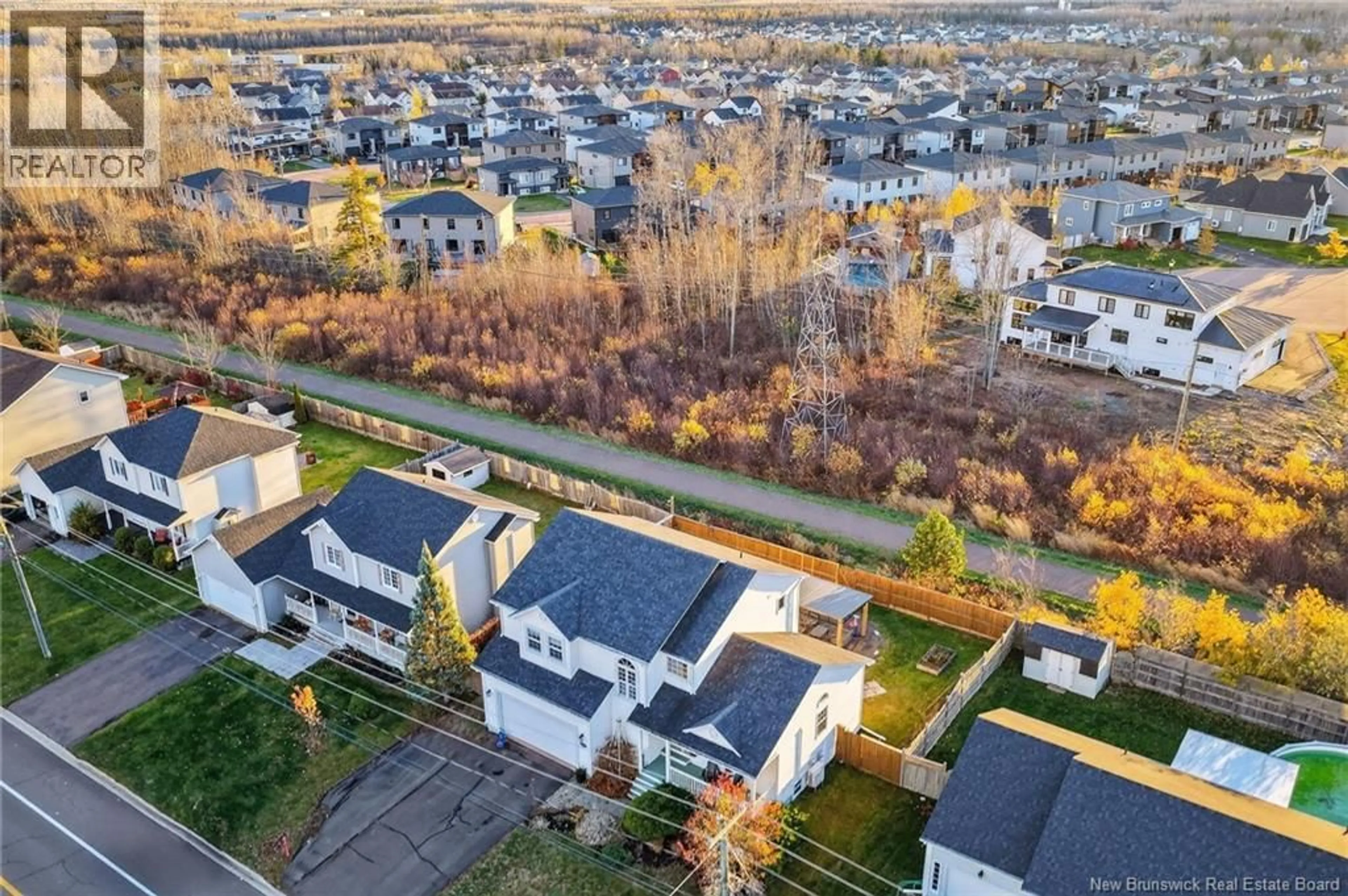 A pic from outside/outdoor area/front of a property/back of a property/a pic from drone, unknown for 162 TWIN OAKS DR, Moncton New Brunswick E1G4W4